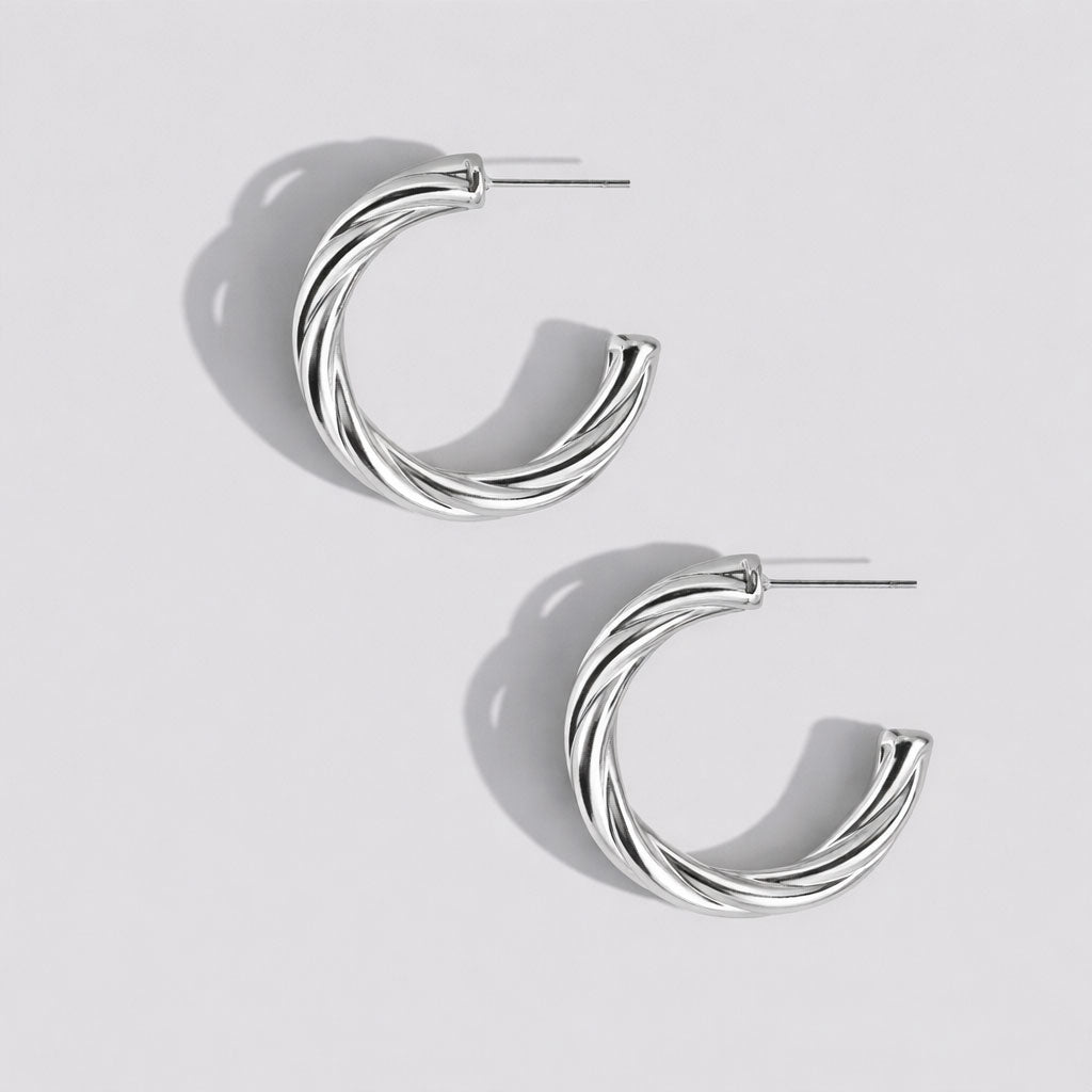 Boucles d'oreilles anneaux torsadés argentés en acier inoxydable