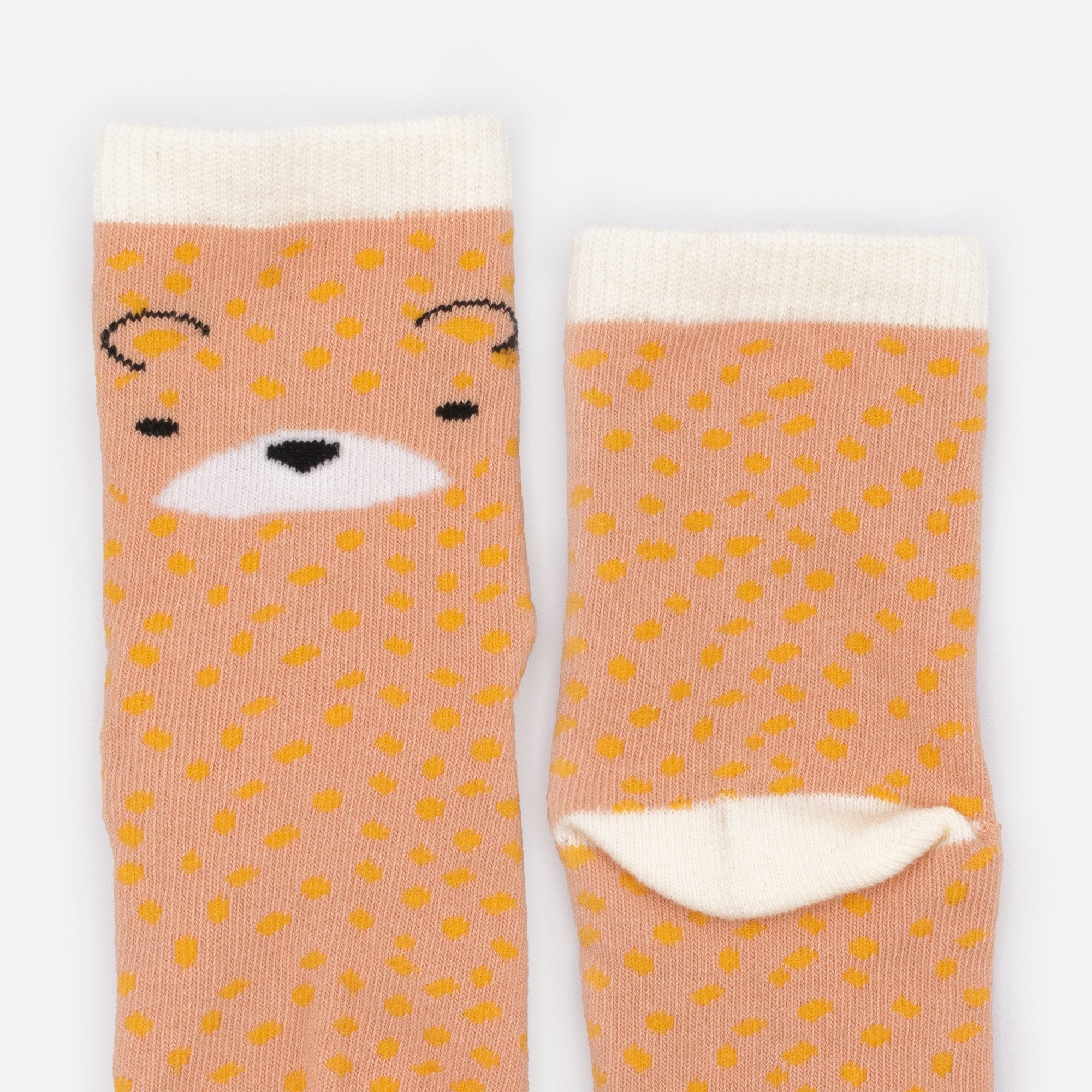 Mini bas oranges & crème avec visage de léopard