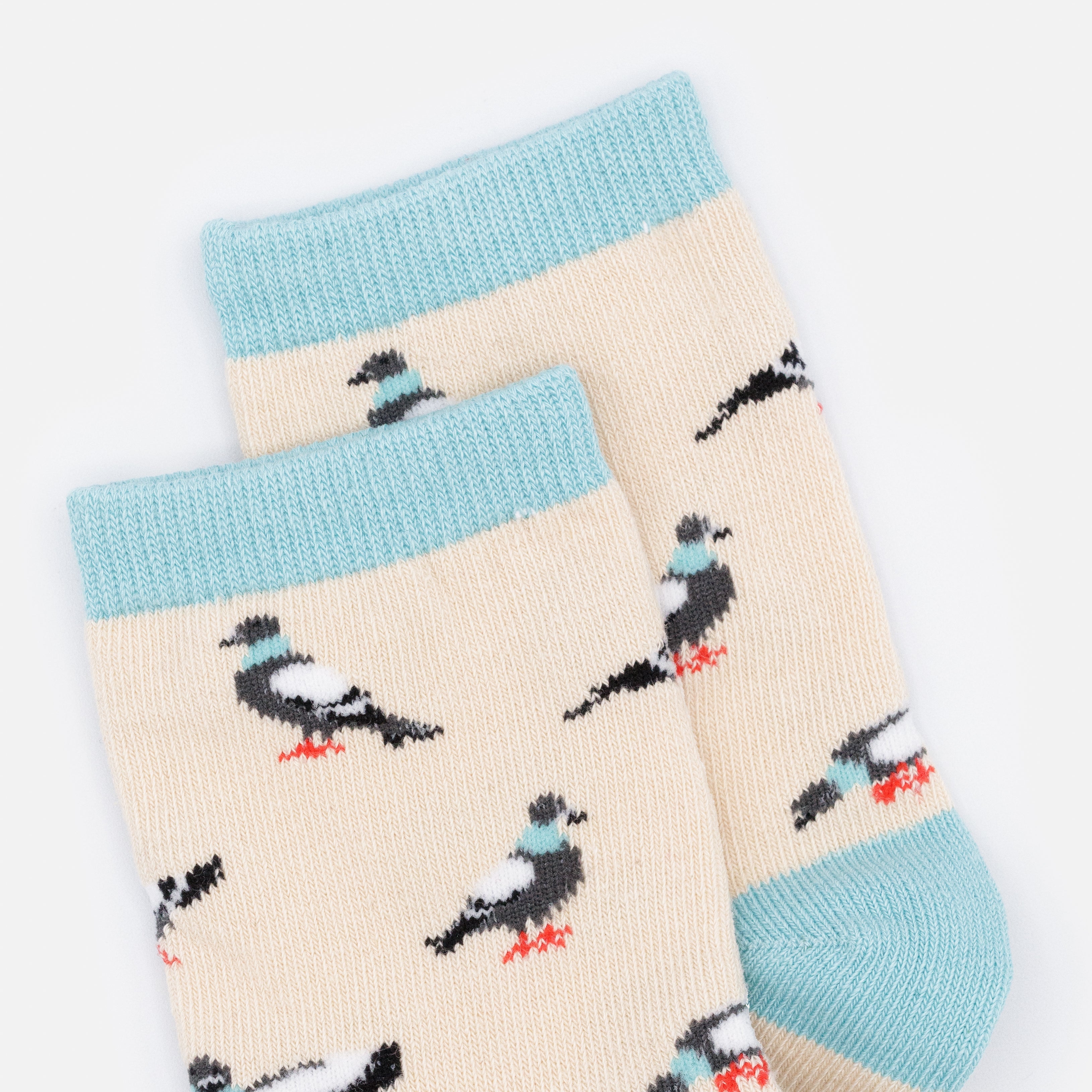 Mini bas beiges & turquoise avec pigeons