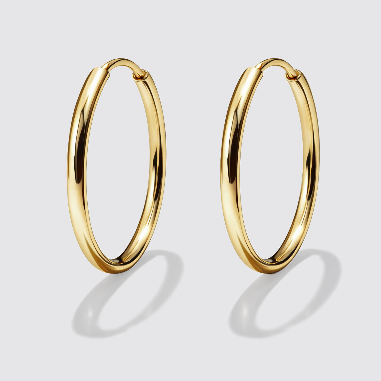 Boucles d'oreilles dormeuses dorées en acier inoxydable
