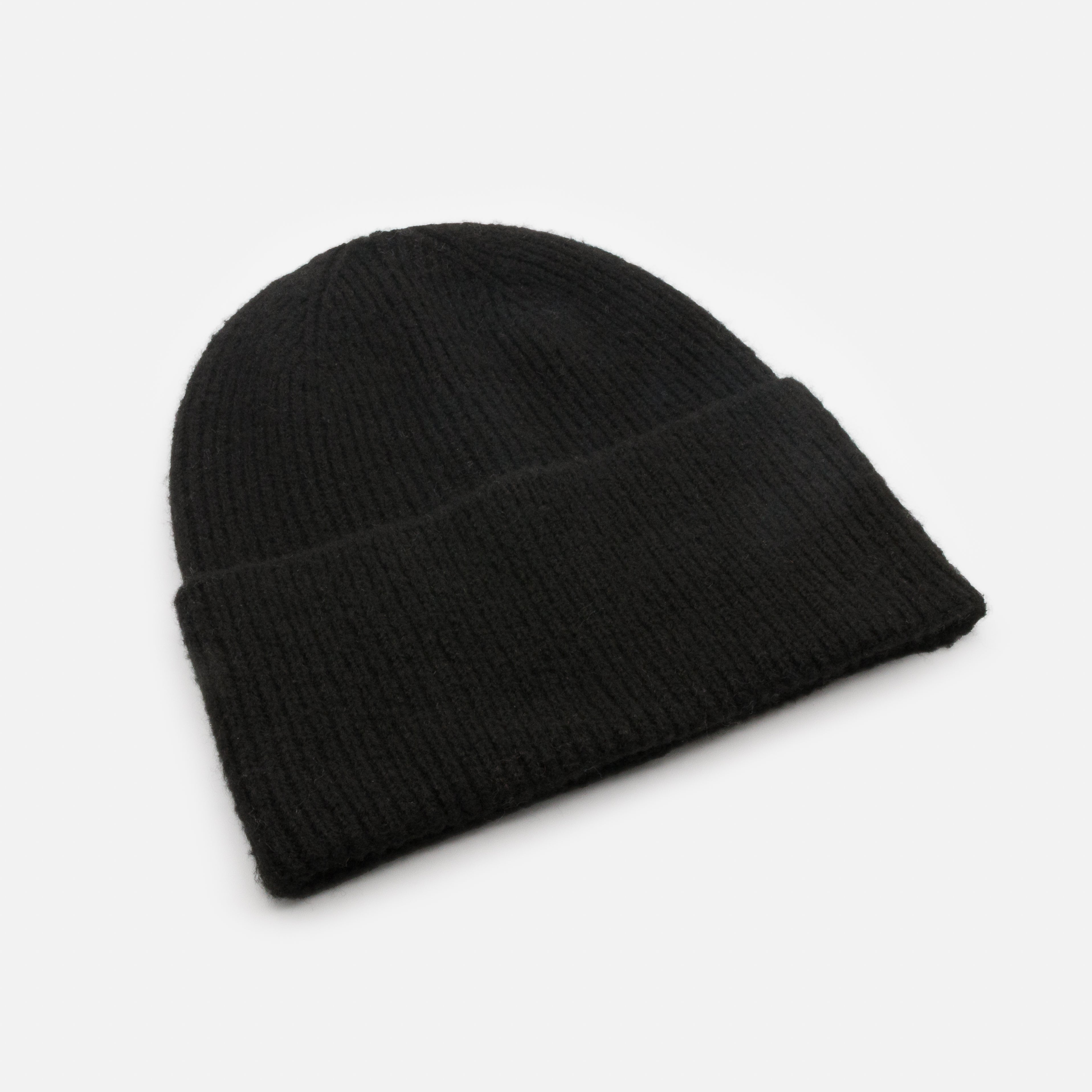 Black knitted toque with small stitches