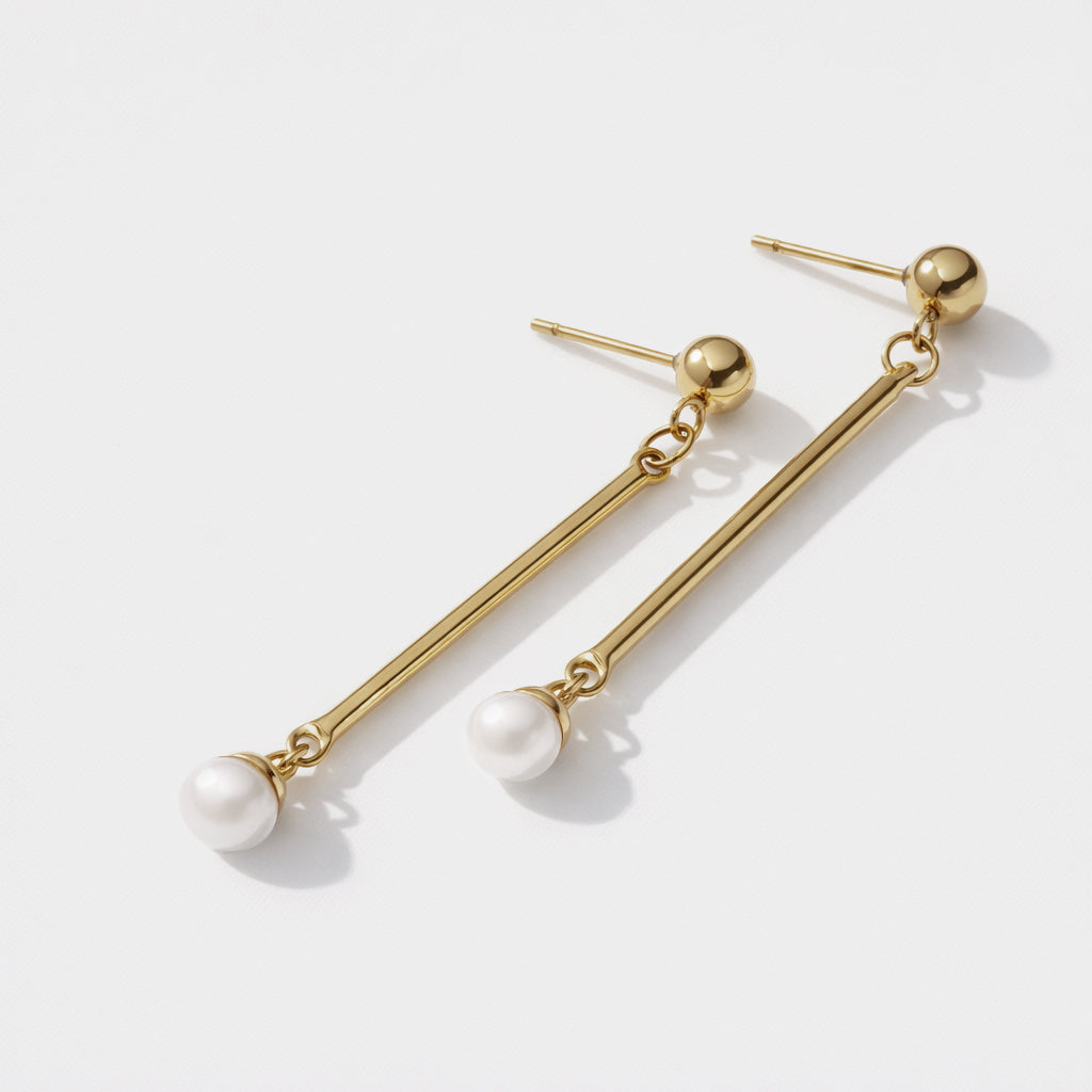Bizou SF253E004GL – Gold stainless steel bar and pearl drop earrings, ball stud top, angled view, Bizou jewelry