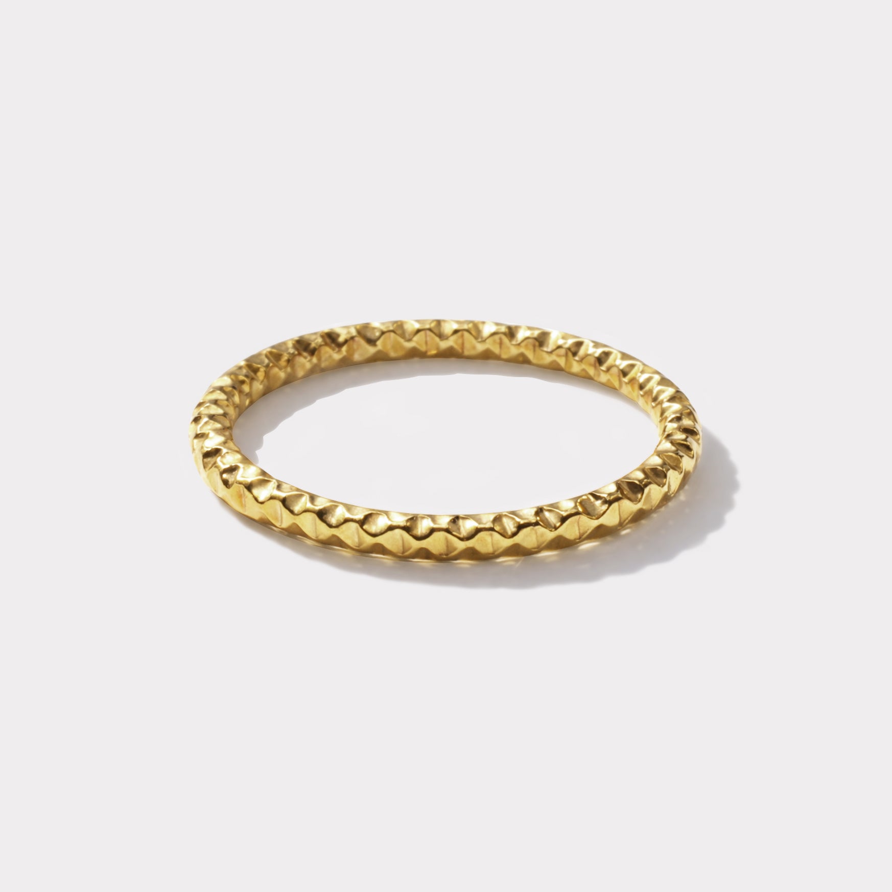 Bizou SF253R033GL – Gold hammered thin stacking ring in stainless steel, delicate textured band, high-polish finish, Bizou jewelry