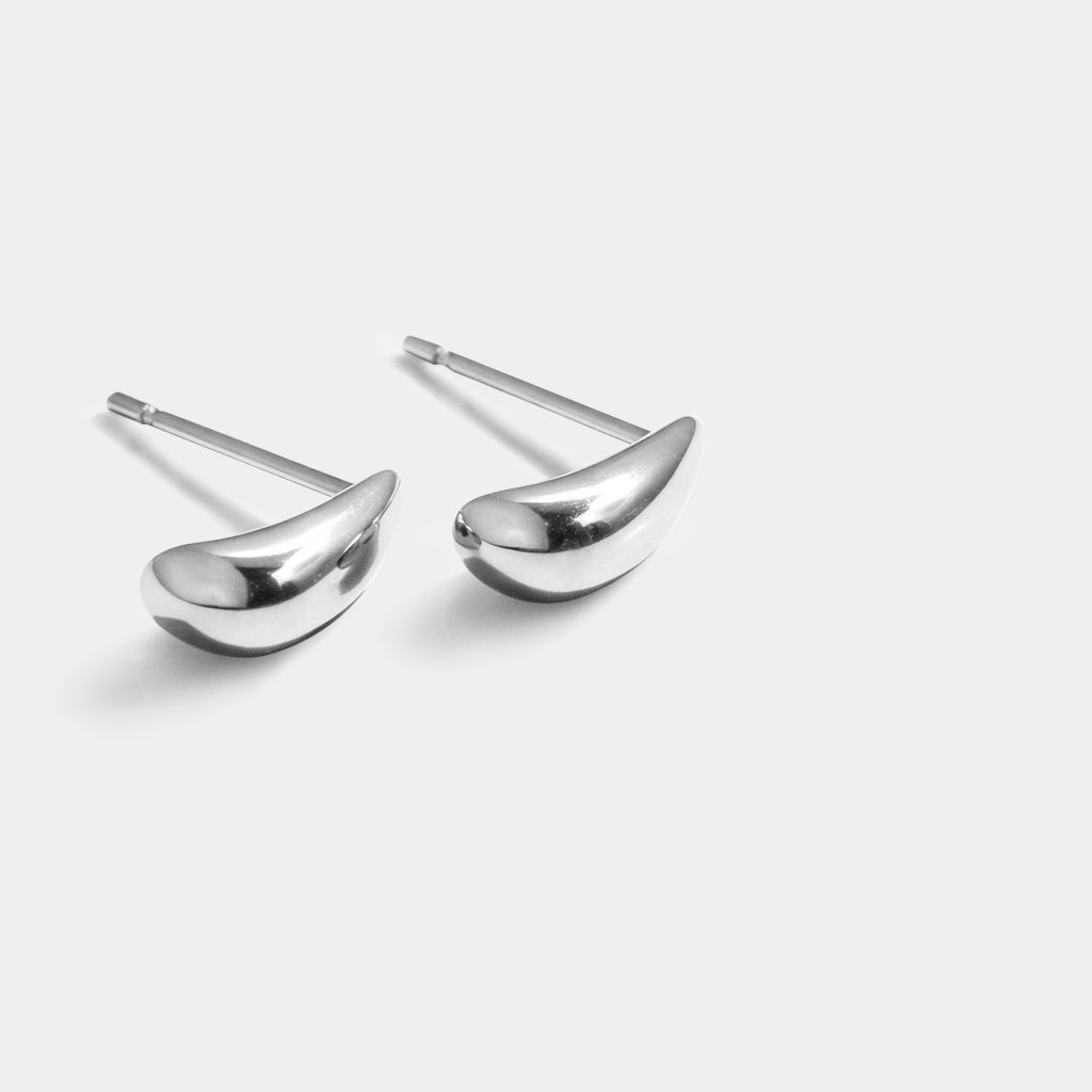 Bizou SS253E008SL – Silver stainless steel mini teardrop stud earrings, sculpted puffy drop, side angle view, Bizou jewelry