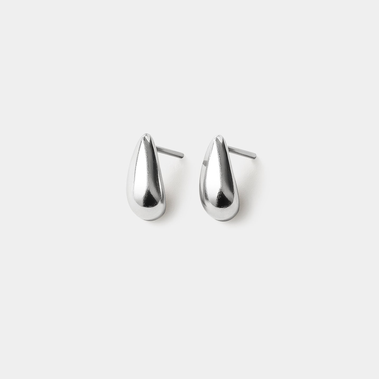 Bizou SS253E008SL – Small silver teardrop stud earrings in stainless steel, chunky dome drop shape, mirror polish, front view