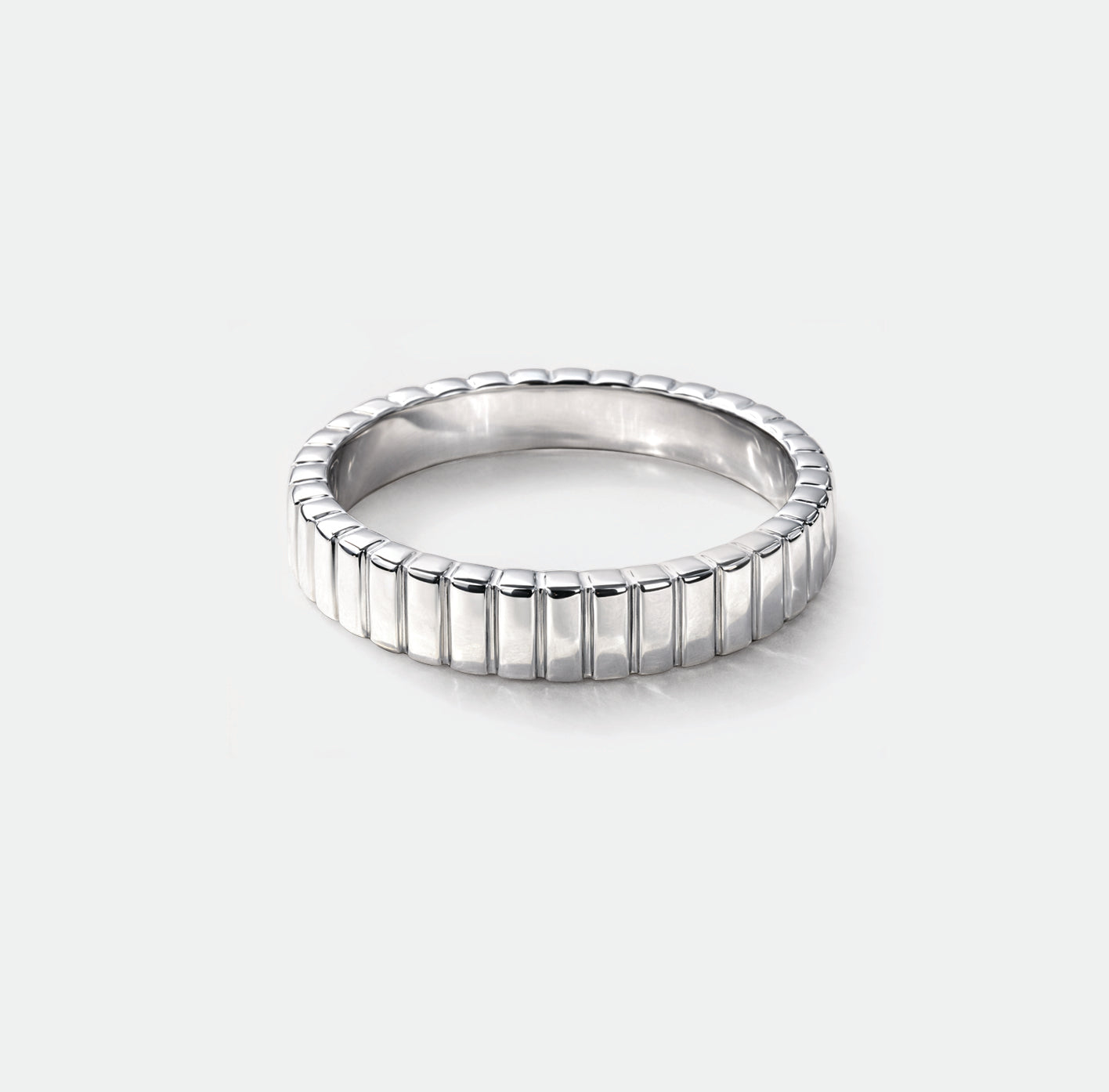 Bizou SS253R022SL – Silver vertical groove band ring in stainless steel, vertical groove texture all around wide flat band, high-polish finish, angled view