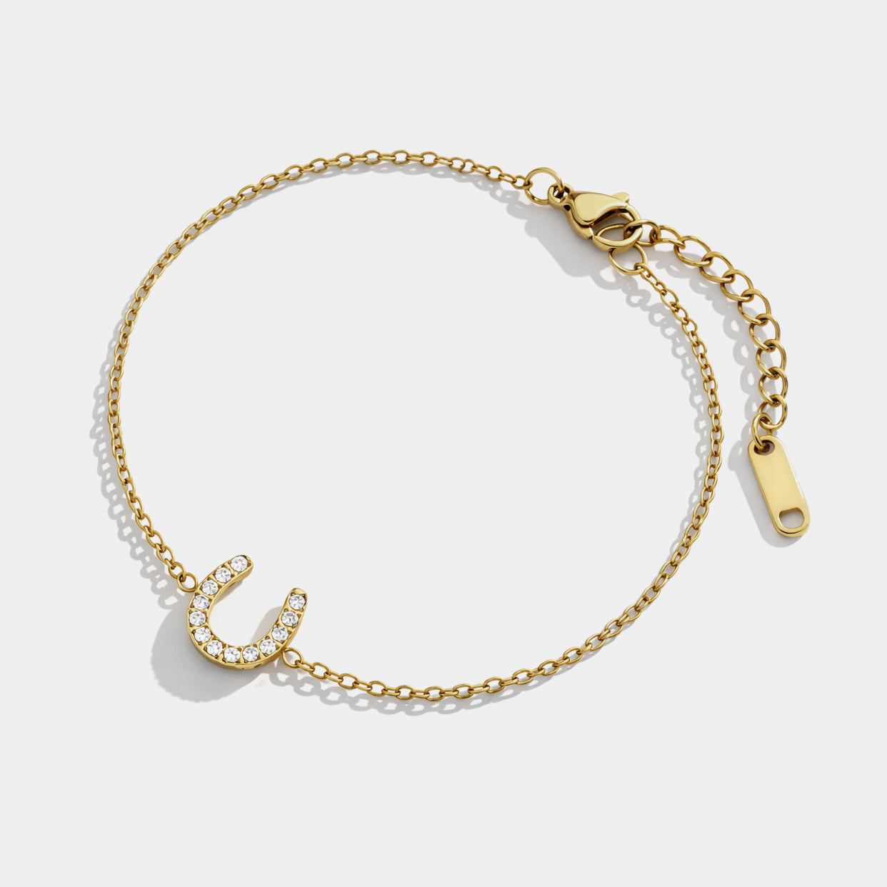 Stainless steel gold horseshoe bracelet with cubic zirconia and lobster clasp – Bizou