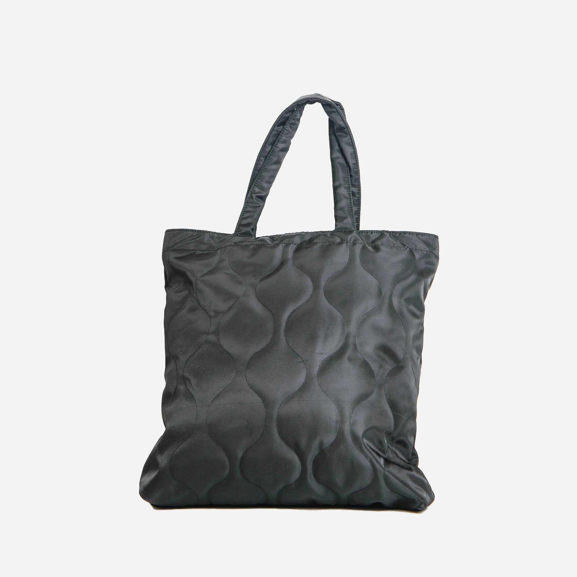 Black quilted tote handbag