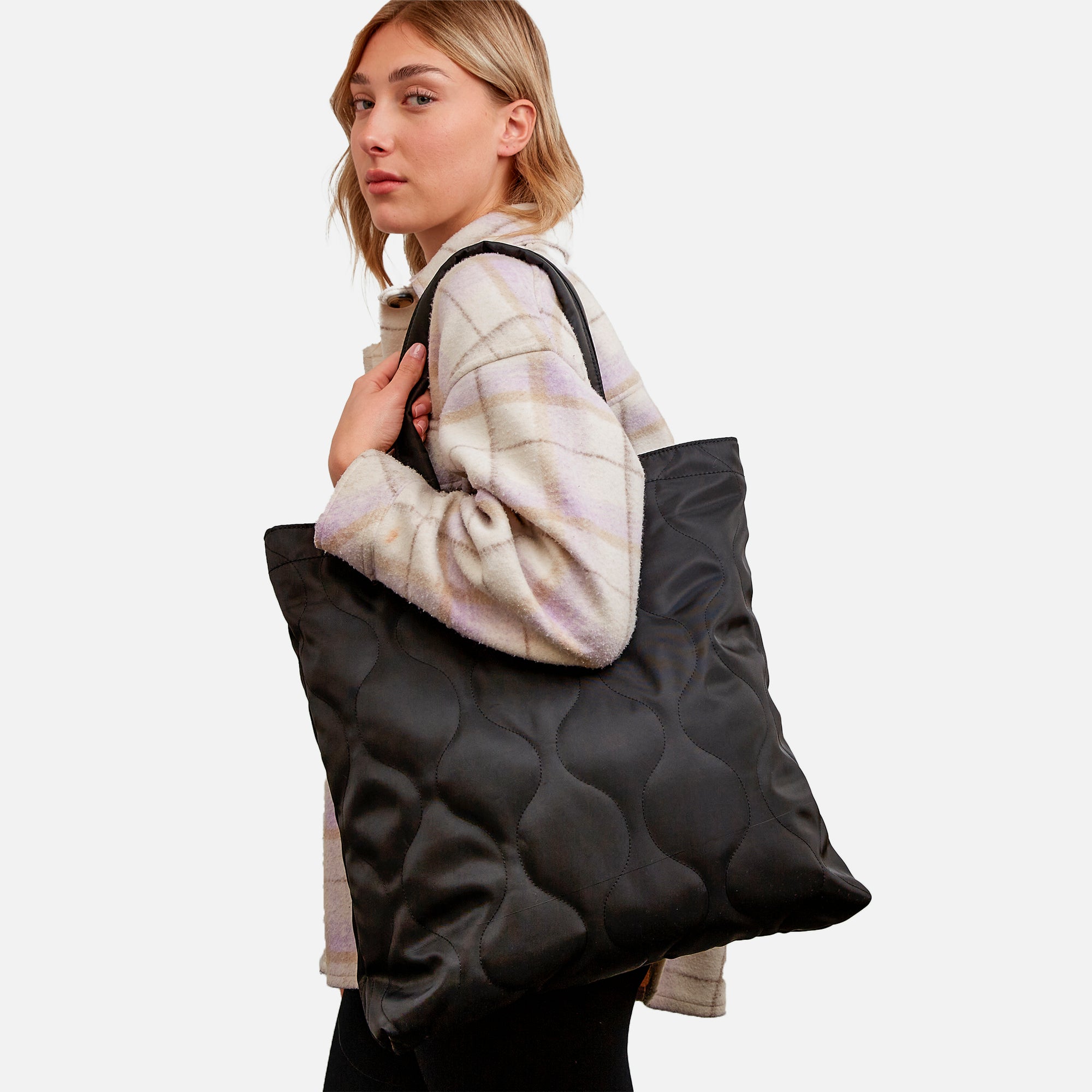 Black quilted tote handbag