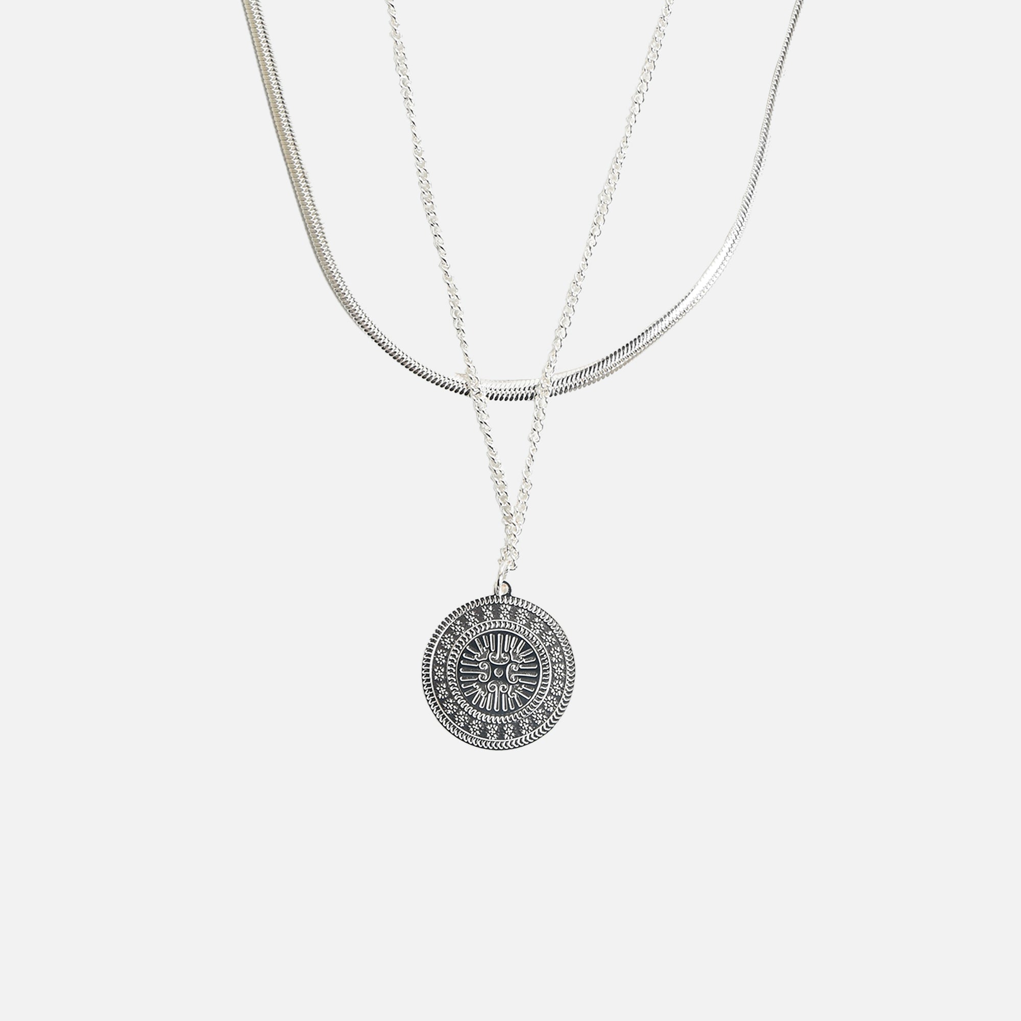 Stainless steel pendant with medallion