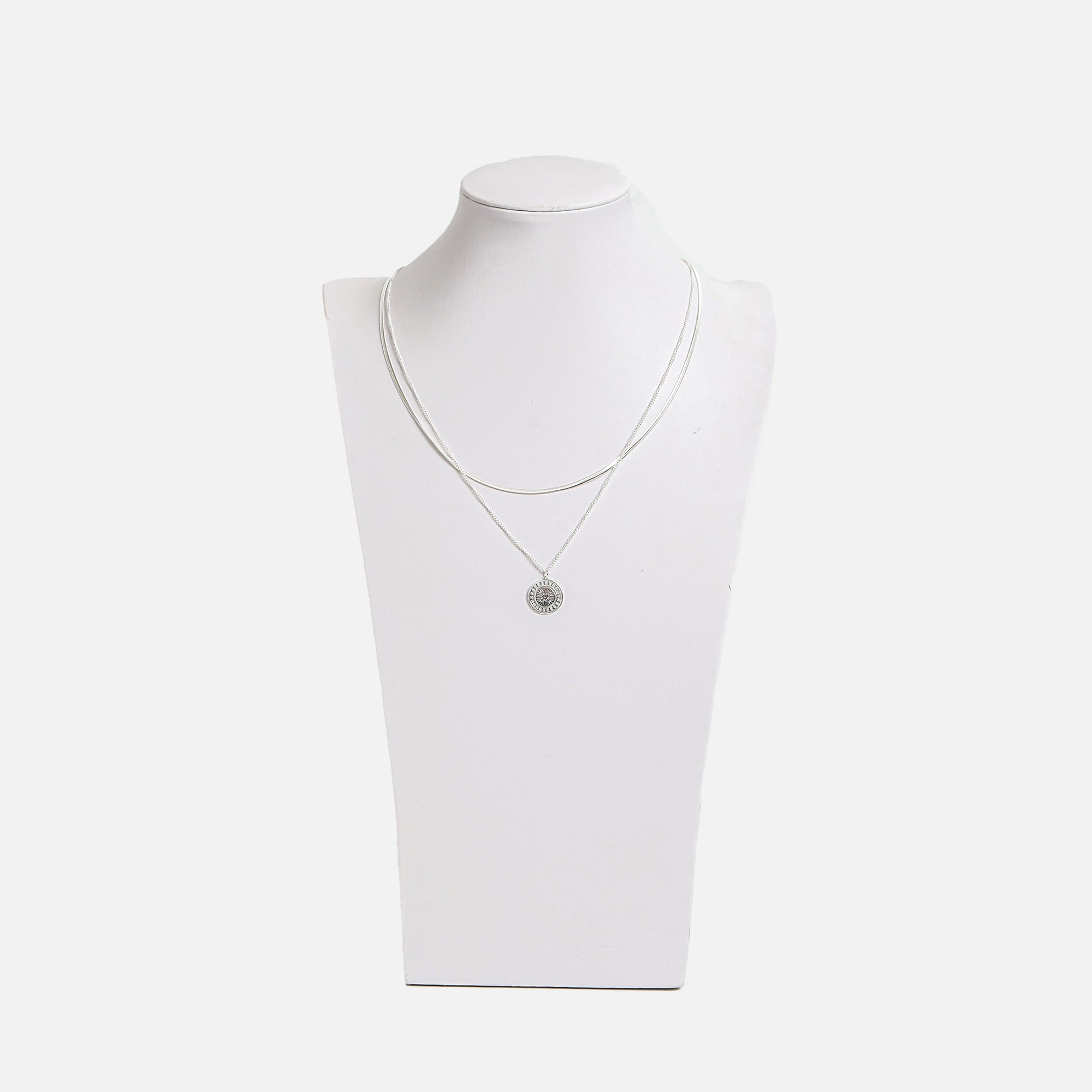 Stainless steel pendant with medallion