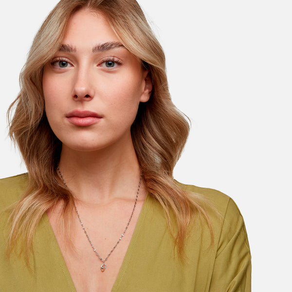 Load image into Gallery viewer, Two tone chained hearts charm in stainless steel