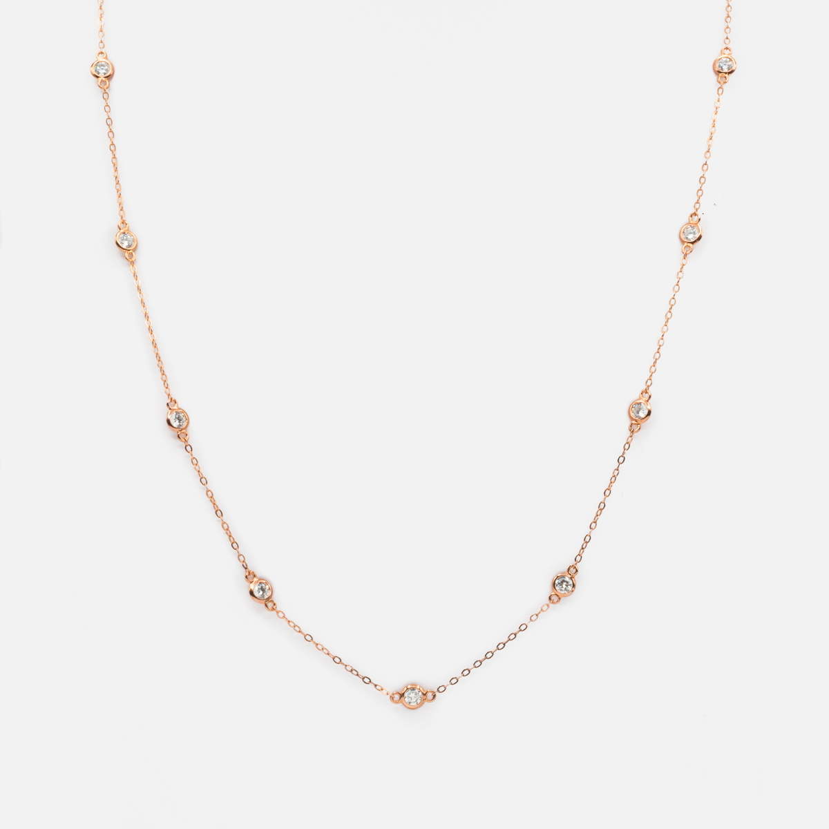 Long rose gold necklace in sterling silver with stones