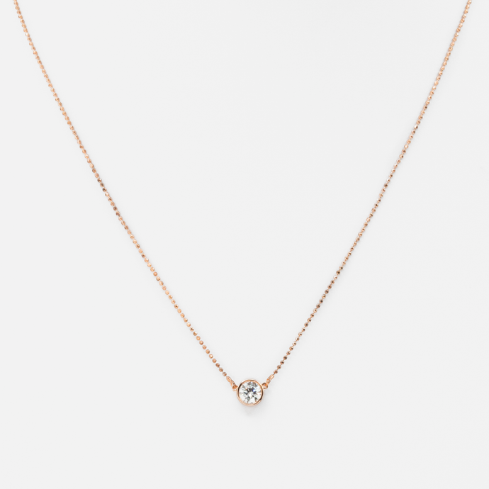 Chaîne rose dorée avec zircon central