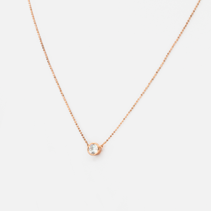Rose gold chain with central zirconia