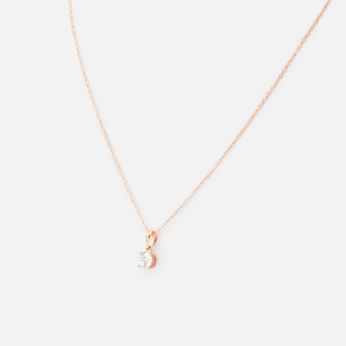 Rose gold necklace and earrings set in sterling silver