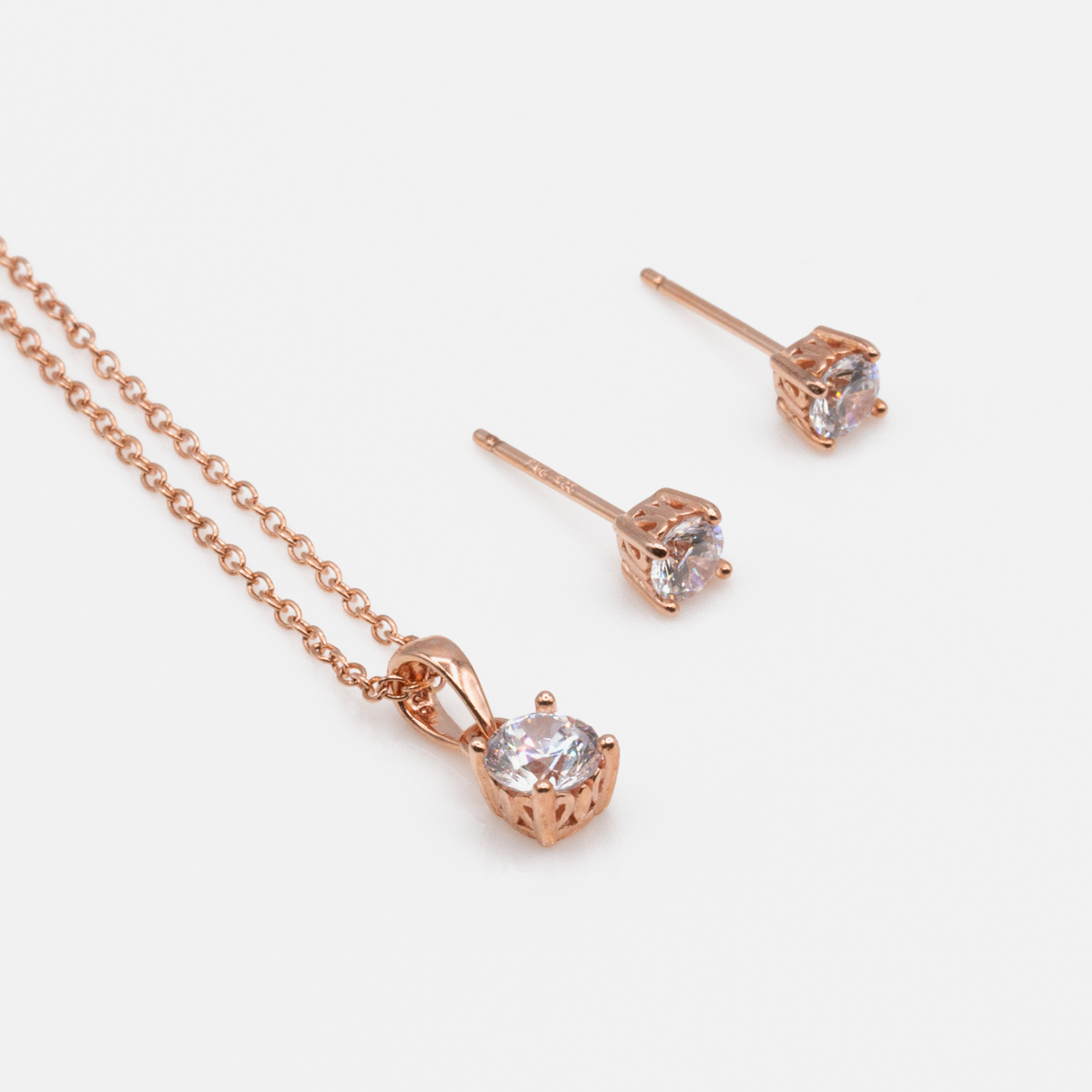 Rose gold necklace and earrings set in sterling silver