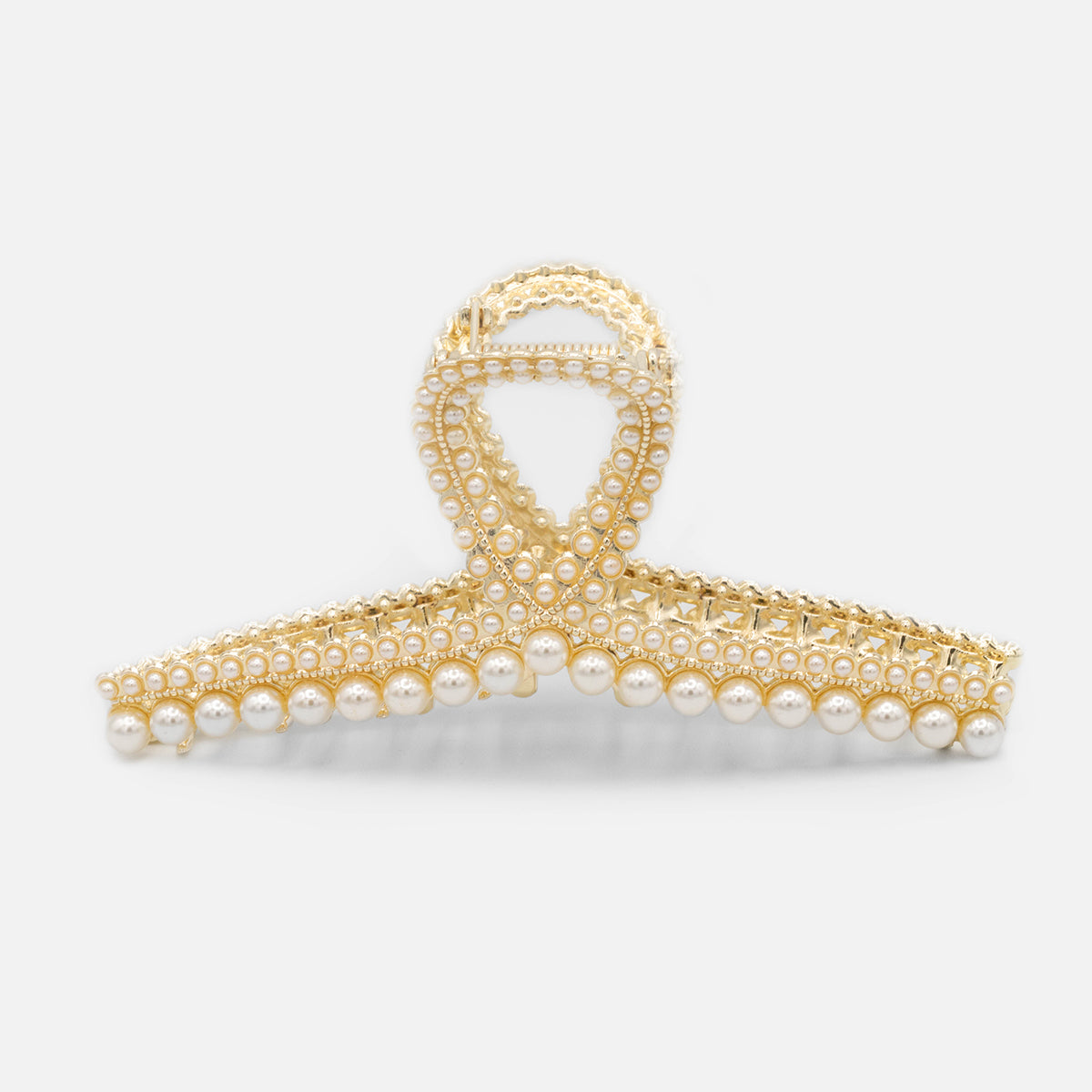 Golden hair clip with pearls