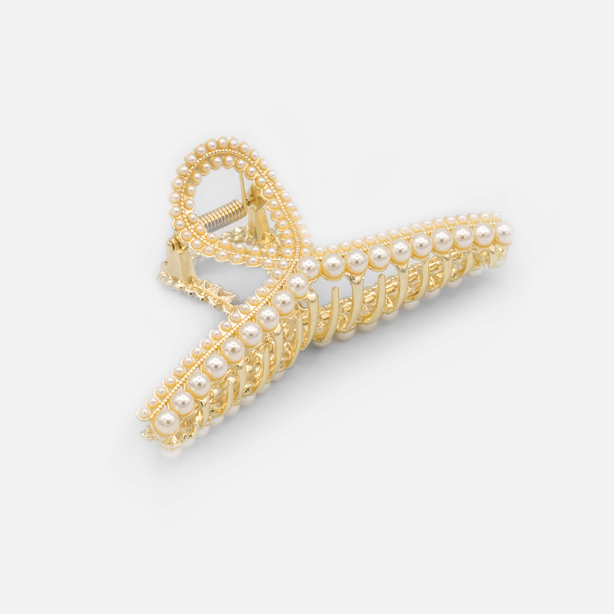 Golden hair clip with pearls