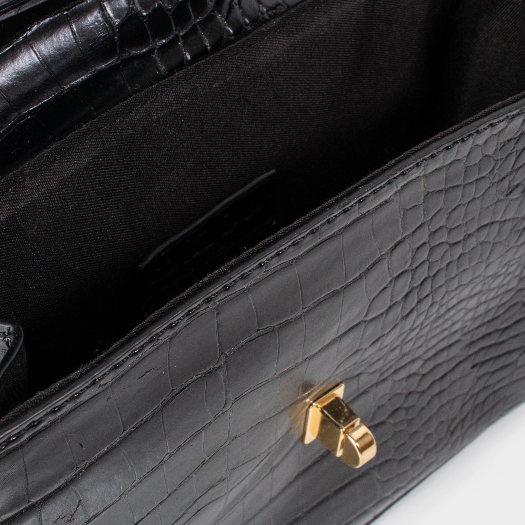 Black crocodile skin shoulder bag with gold lock