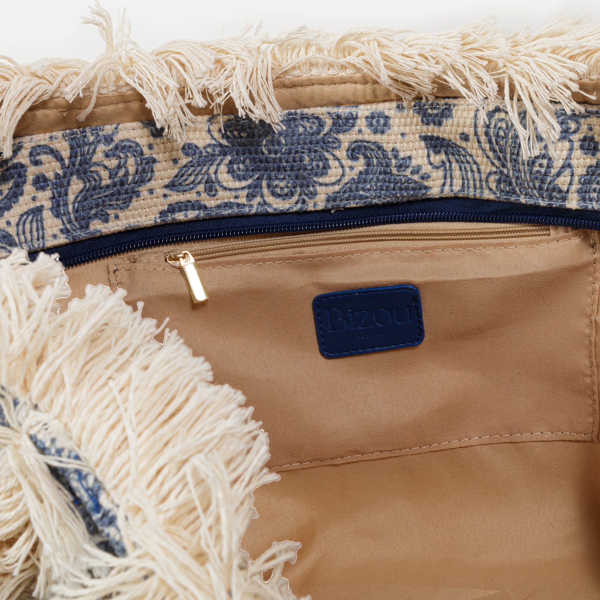 Blue patterned and fringed tote bag