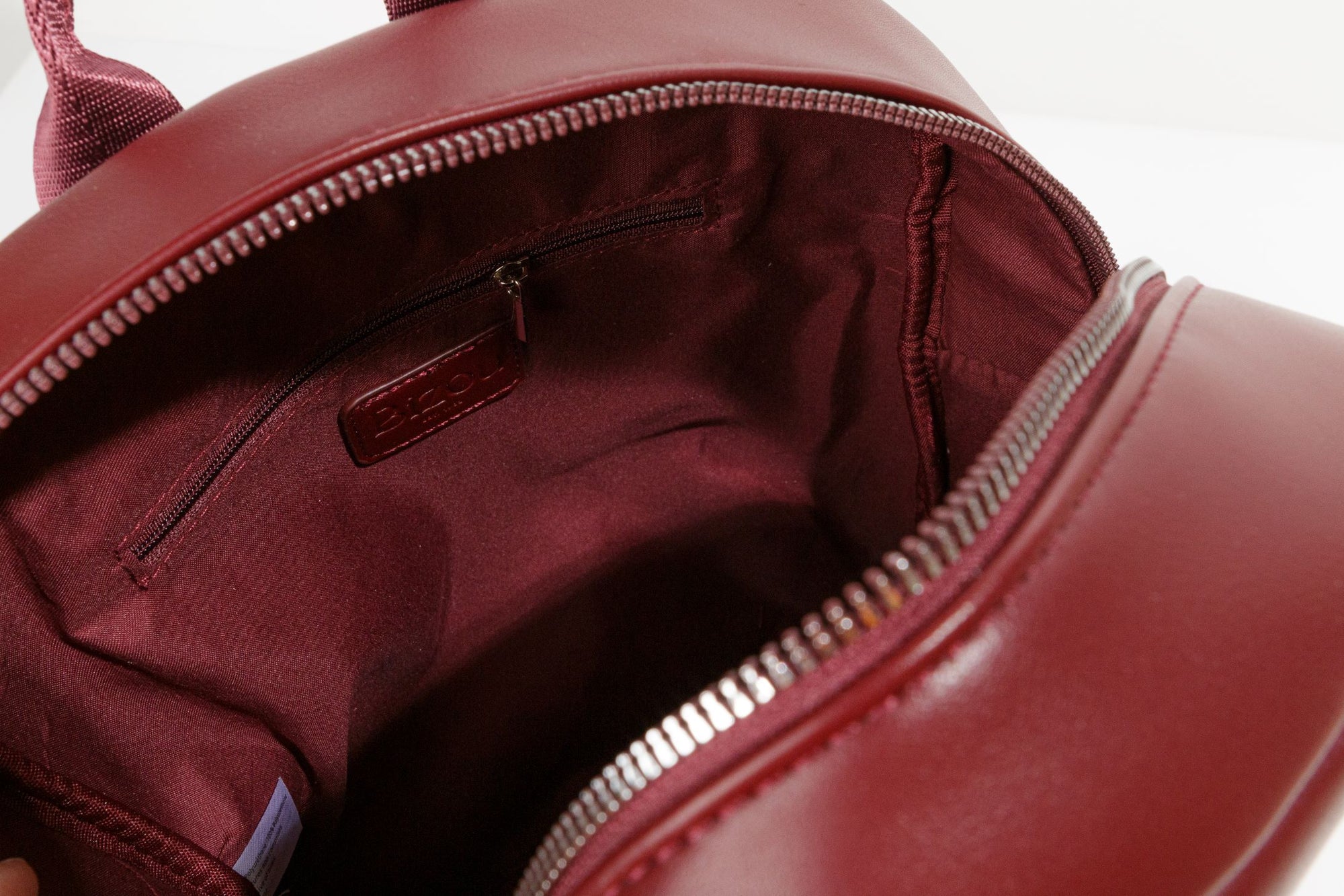 Wine red backpack with nylon straps