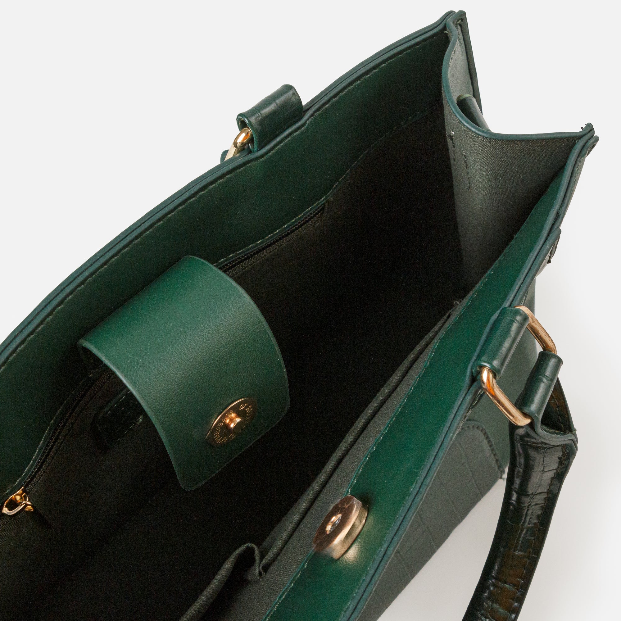 Dark green handbag with crocodile skin details