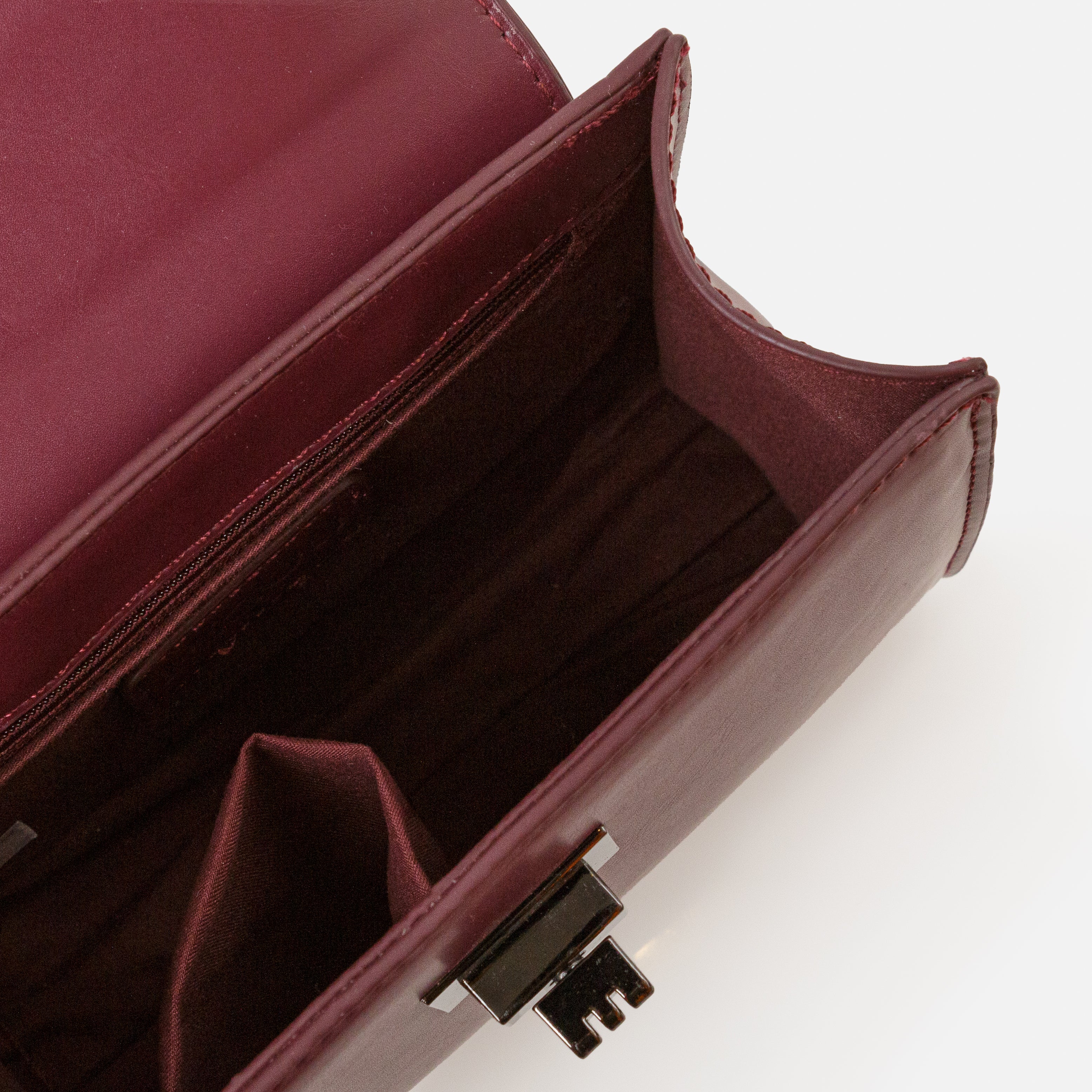 Small plum handbag