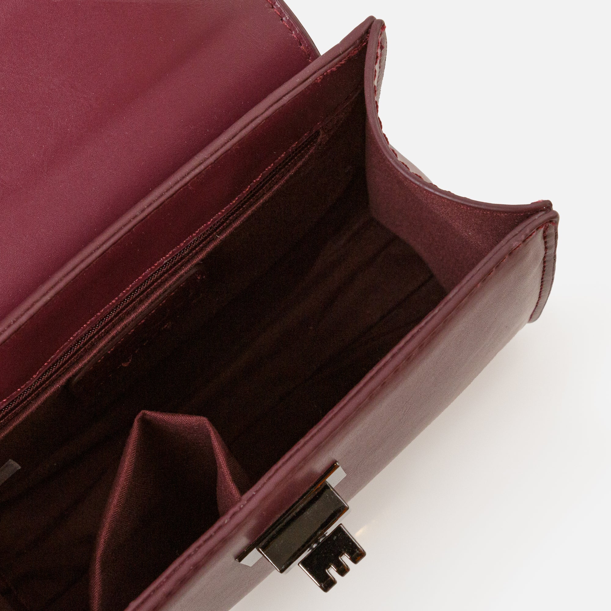 Small plum handbag