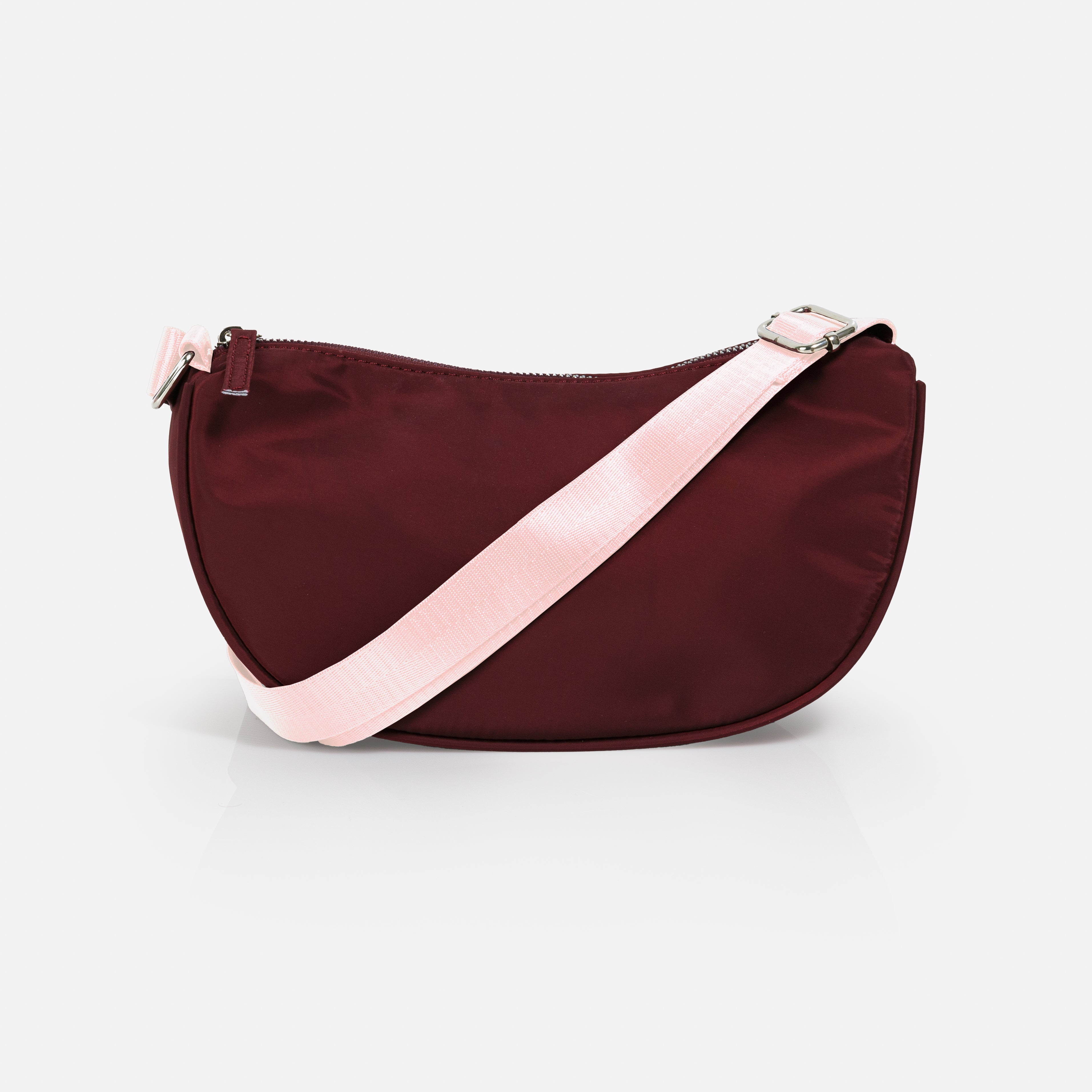 Purple nylon crossbody bag with pale pink strap