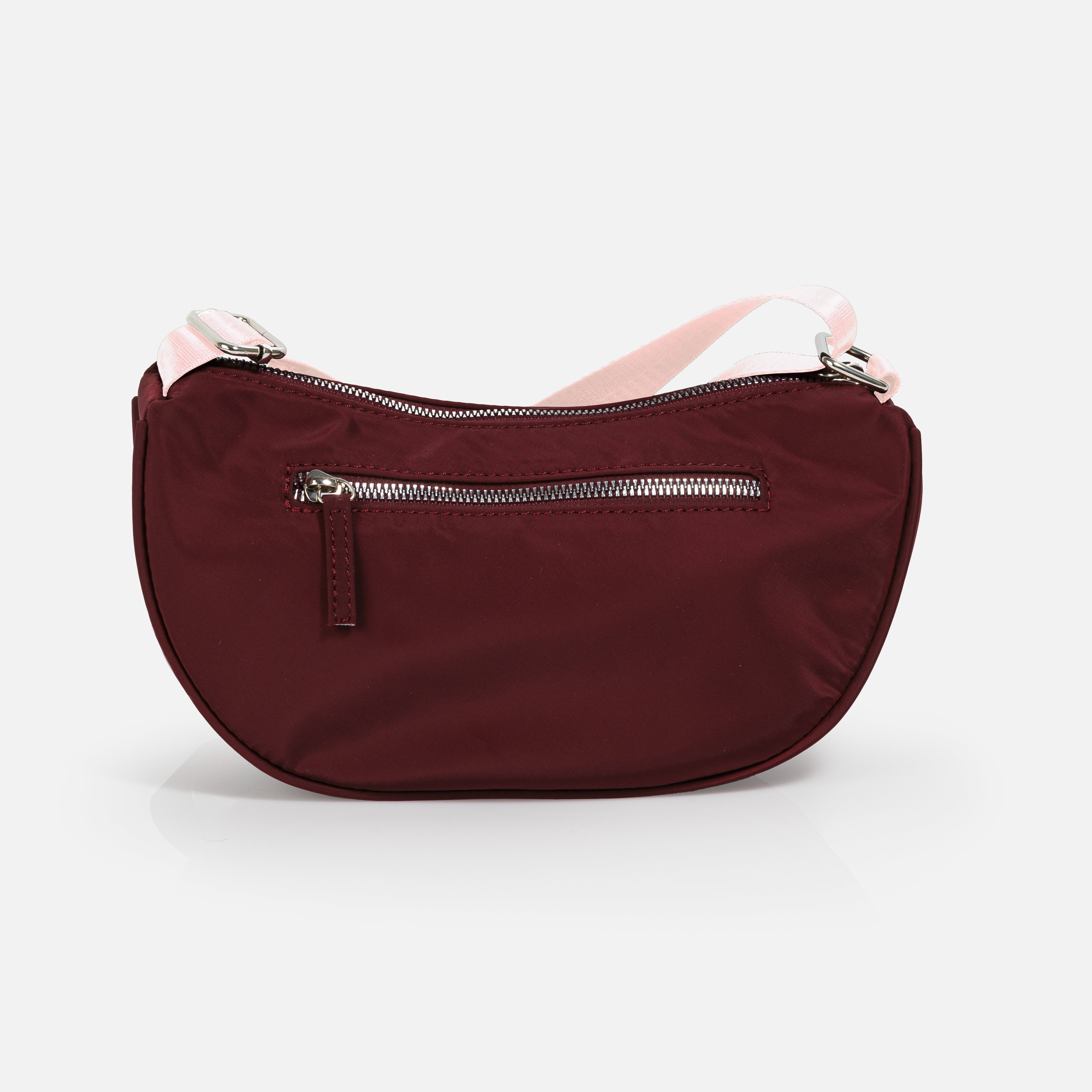 Purple nylon crossbody bag with pale pink strap