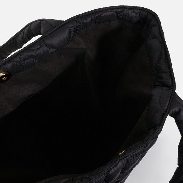 Load image into Gallery viewer, Black quilted nylon tote bag with embroidered flowers
