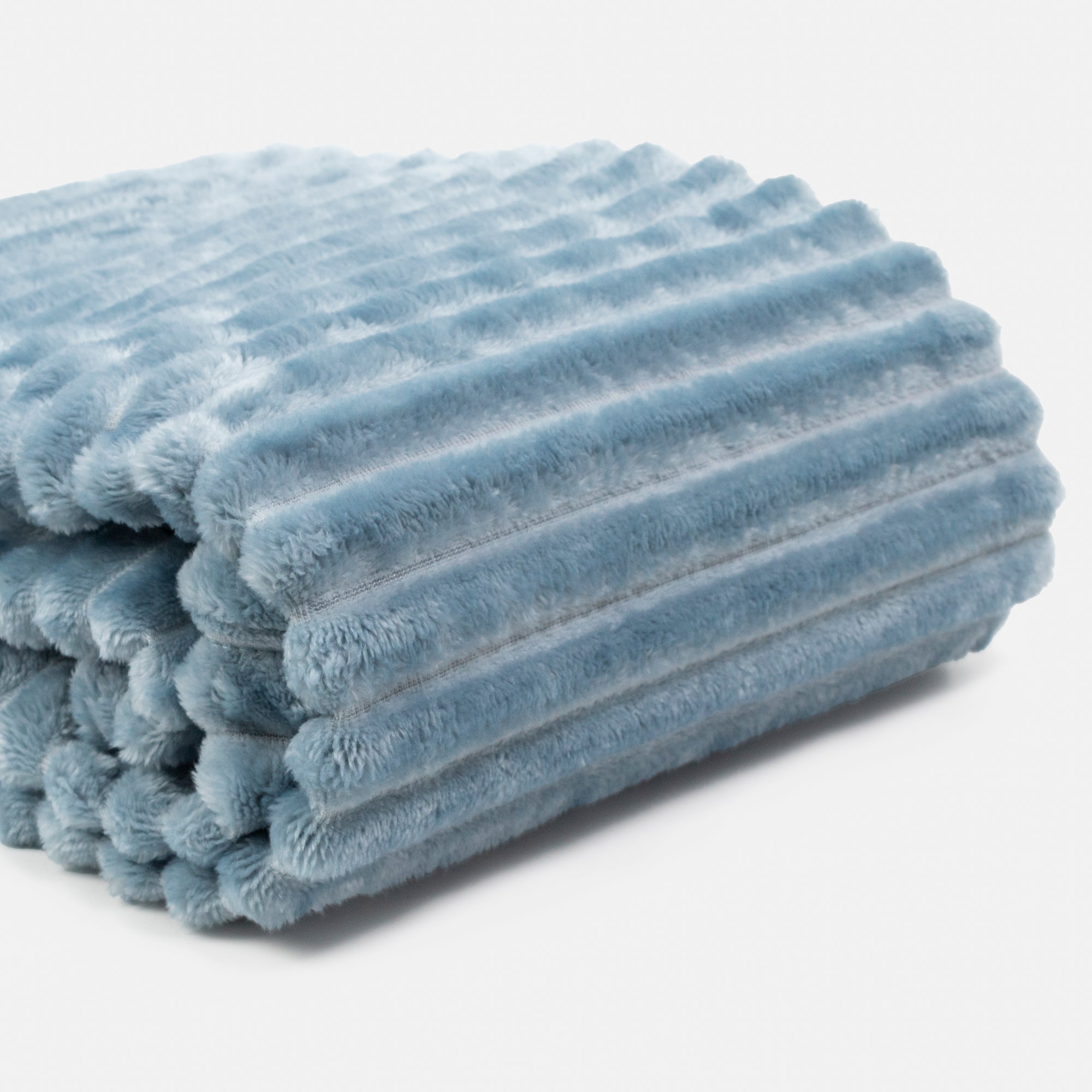 Small blue ribbed blanket