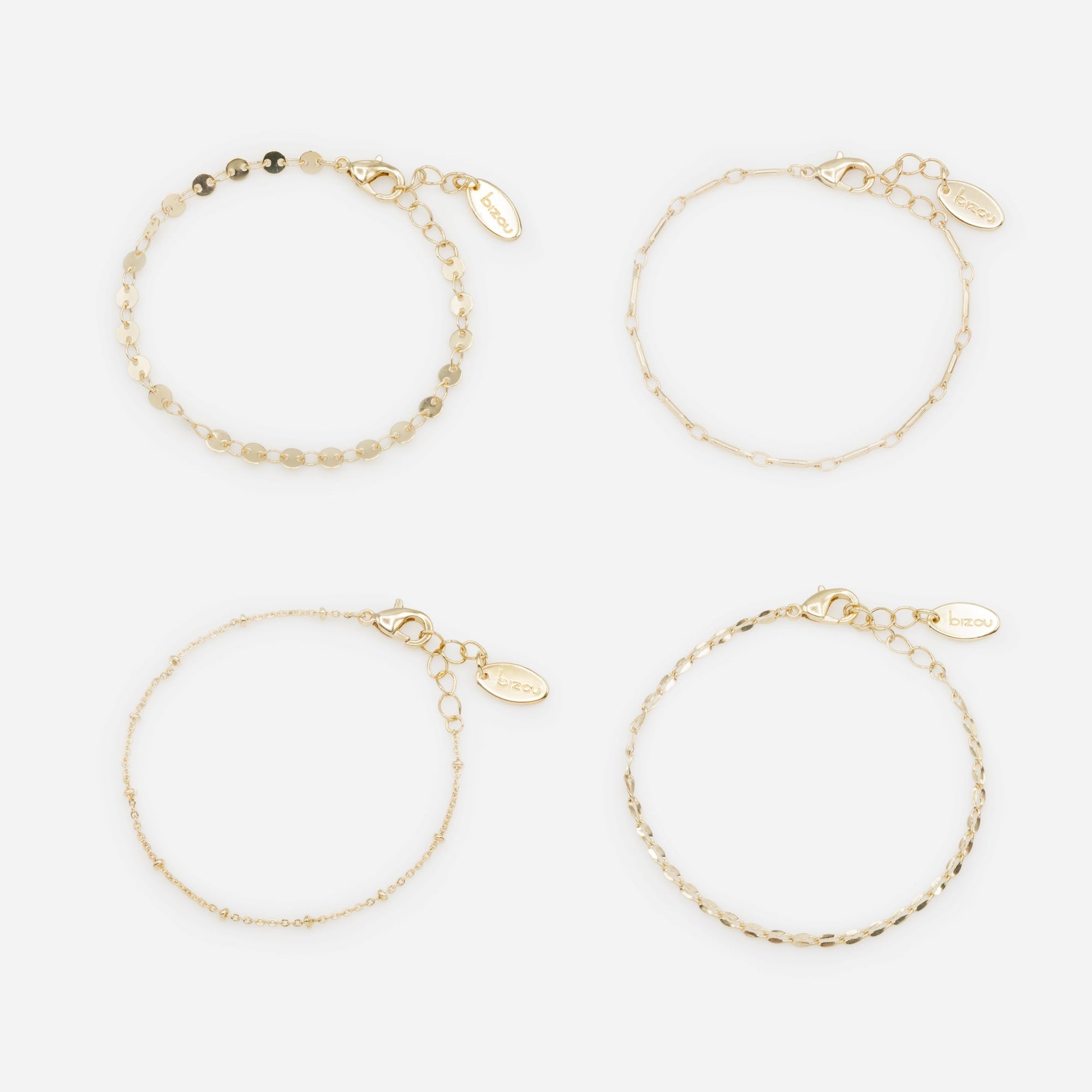 Set of four golden bracelets with original links