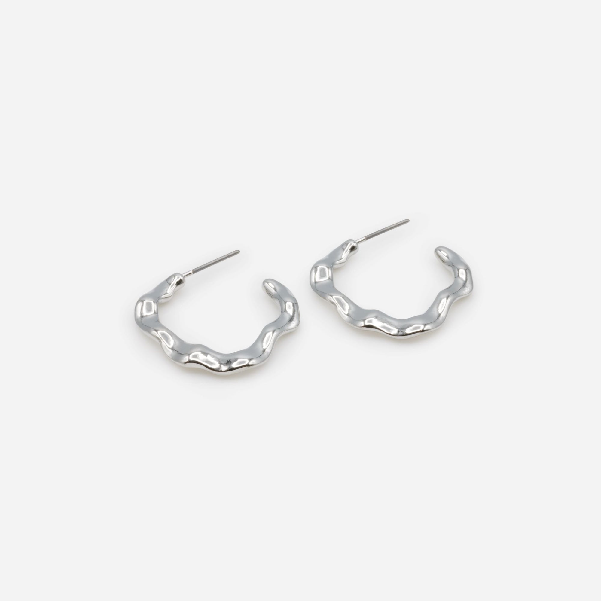 Irregular silver hoop earrings