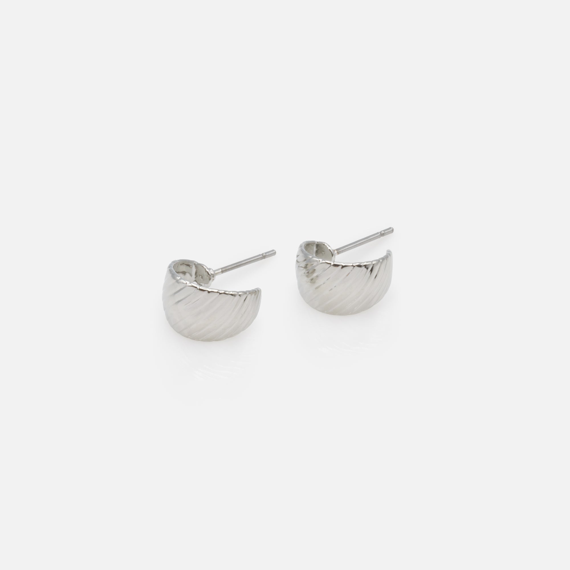 Open silver hoop earrings with grooves