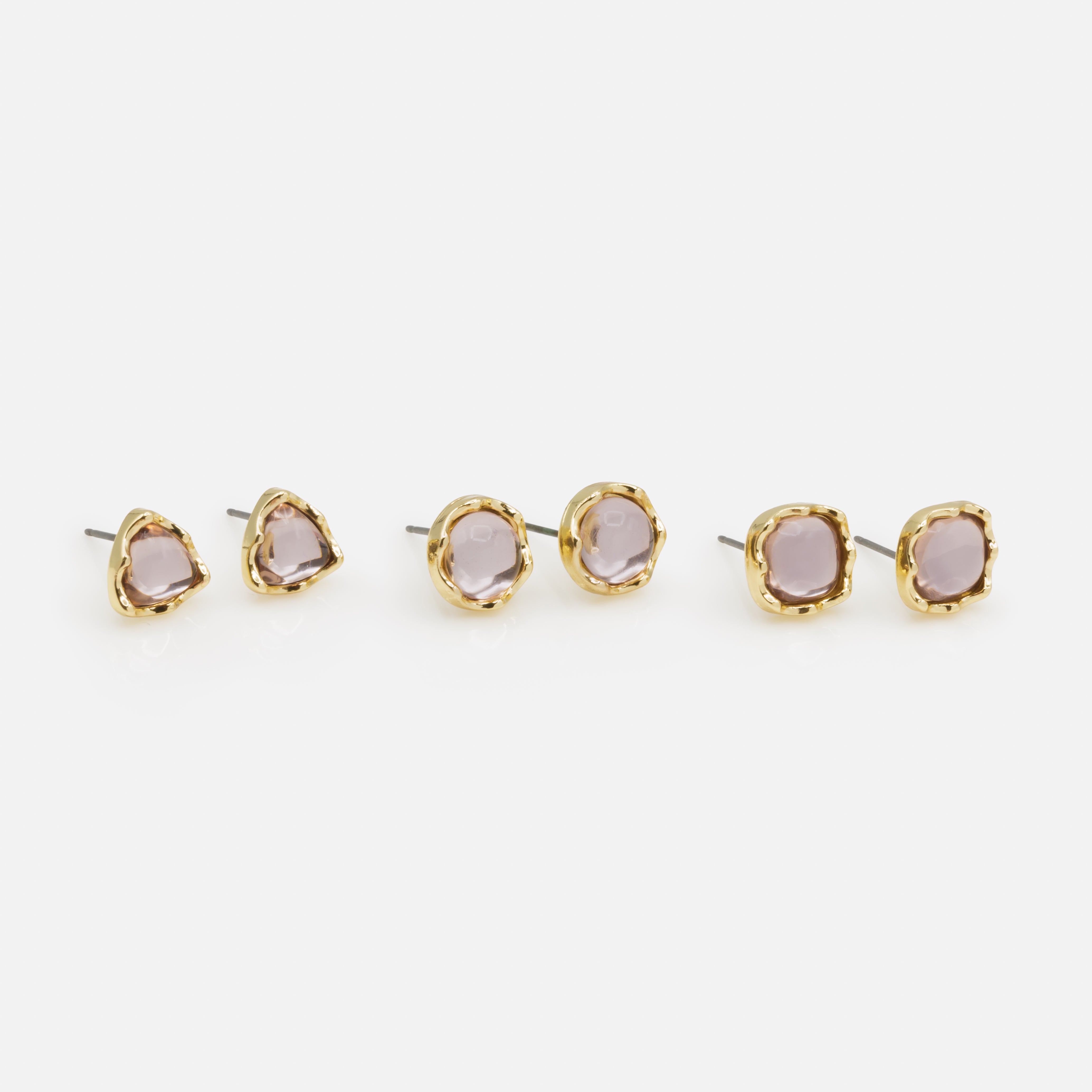 Trio de boucles d'oreilles fixes dorées de formes différentes avec pierre rose pâle