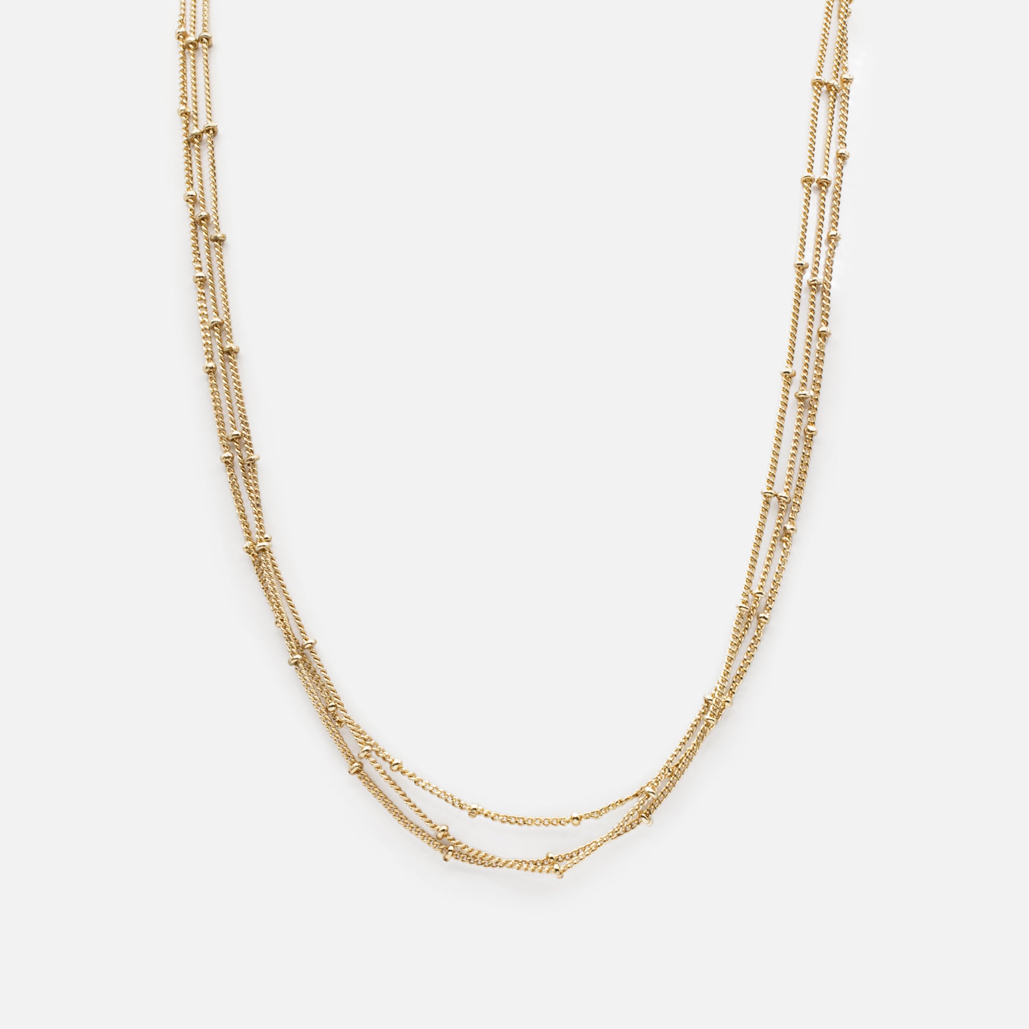 Triple gold chain with small discs