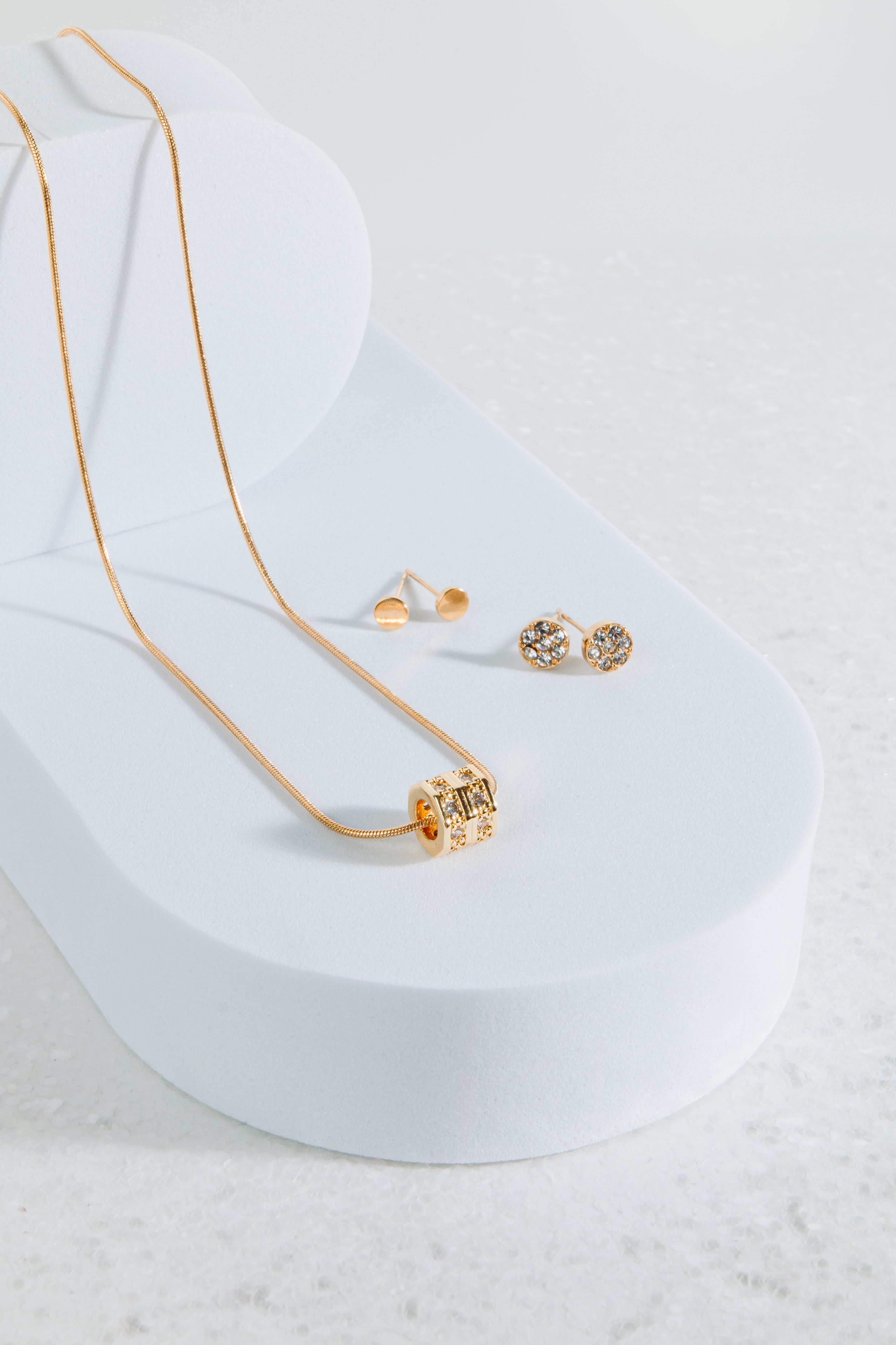 Collier doré cylindre texturé en acier inoxydable