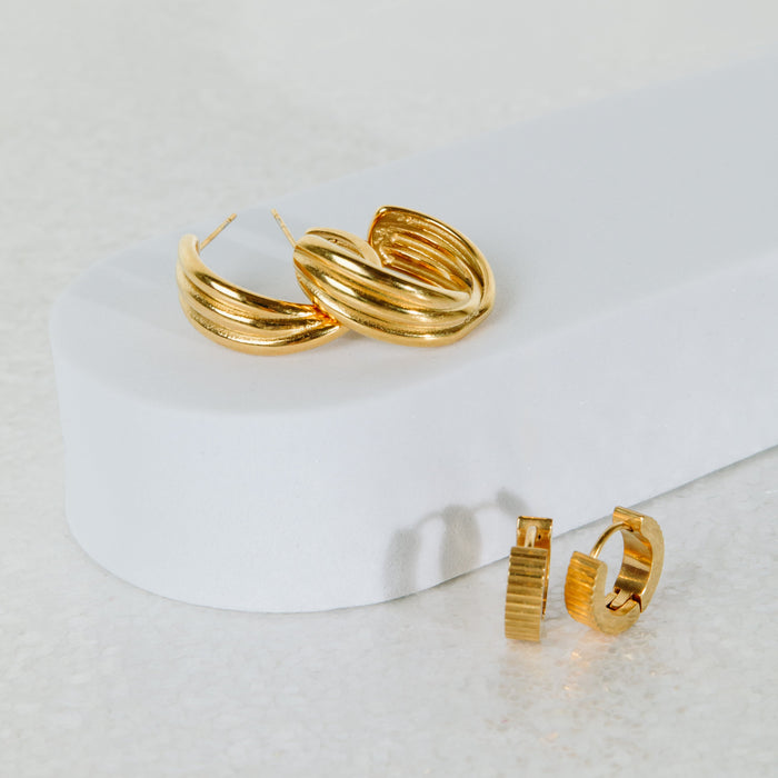 Gold hourglass hoop earrings in stainless steel