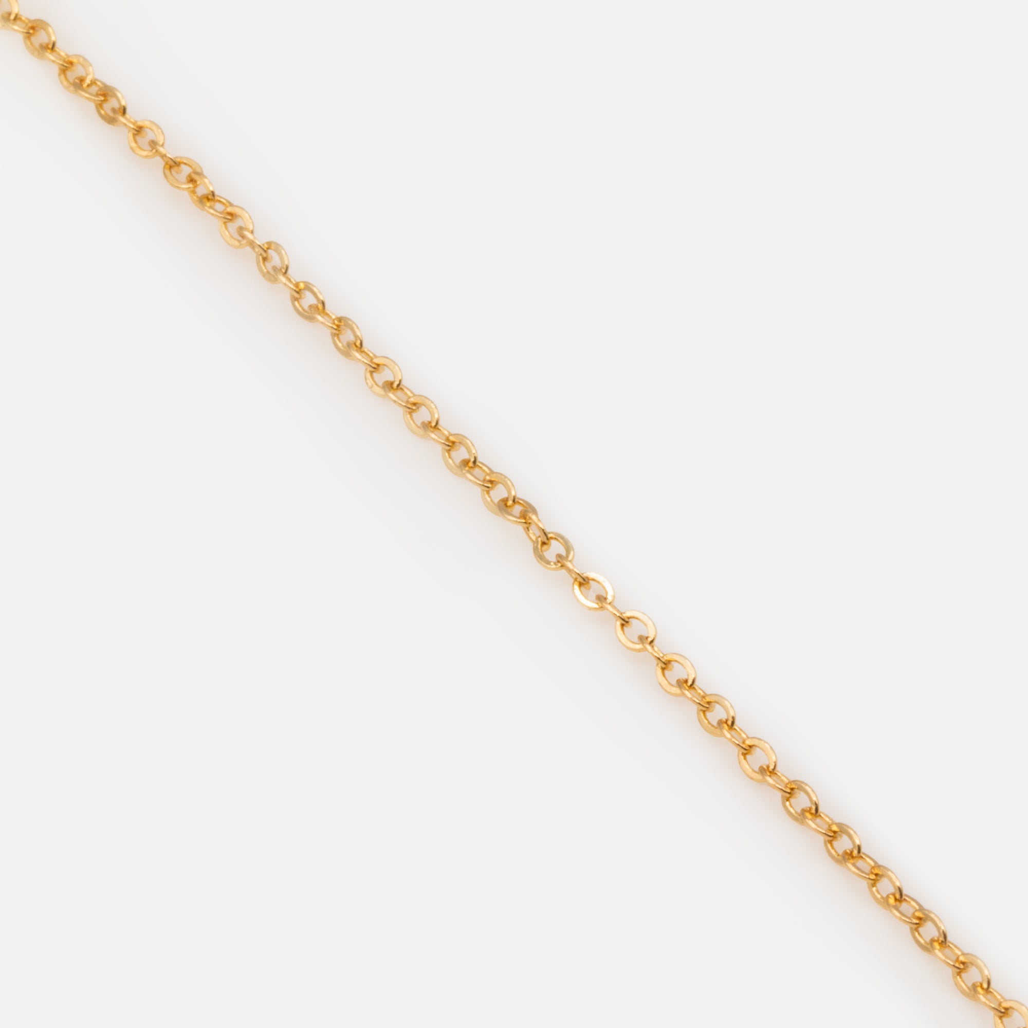 Set of three gold bracelets with stones