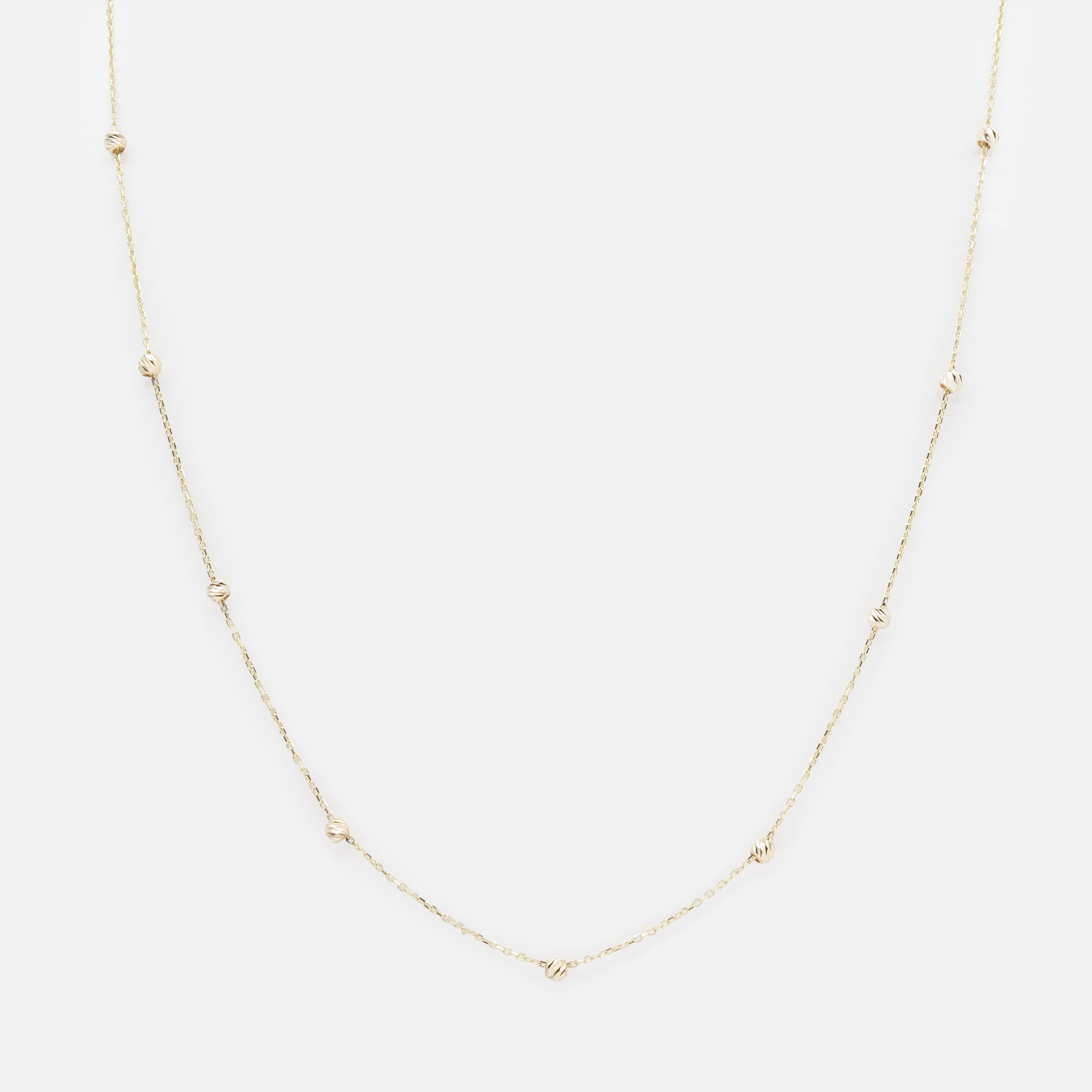 18-inch chain with small textured beads in 10-karat gold