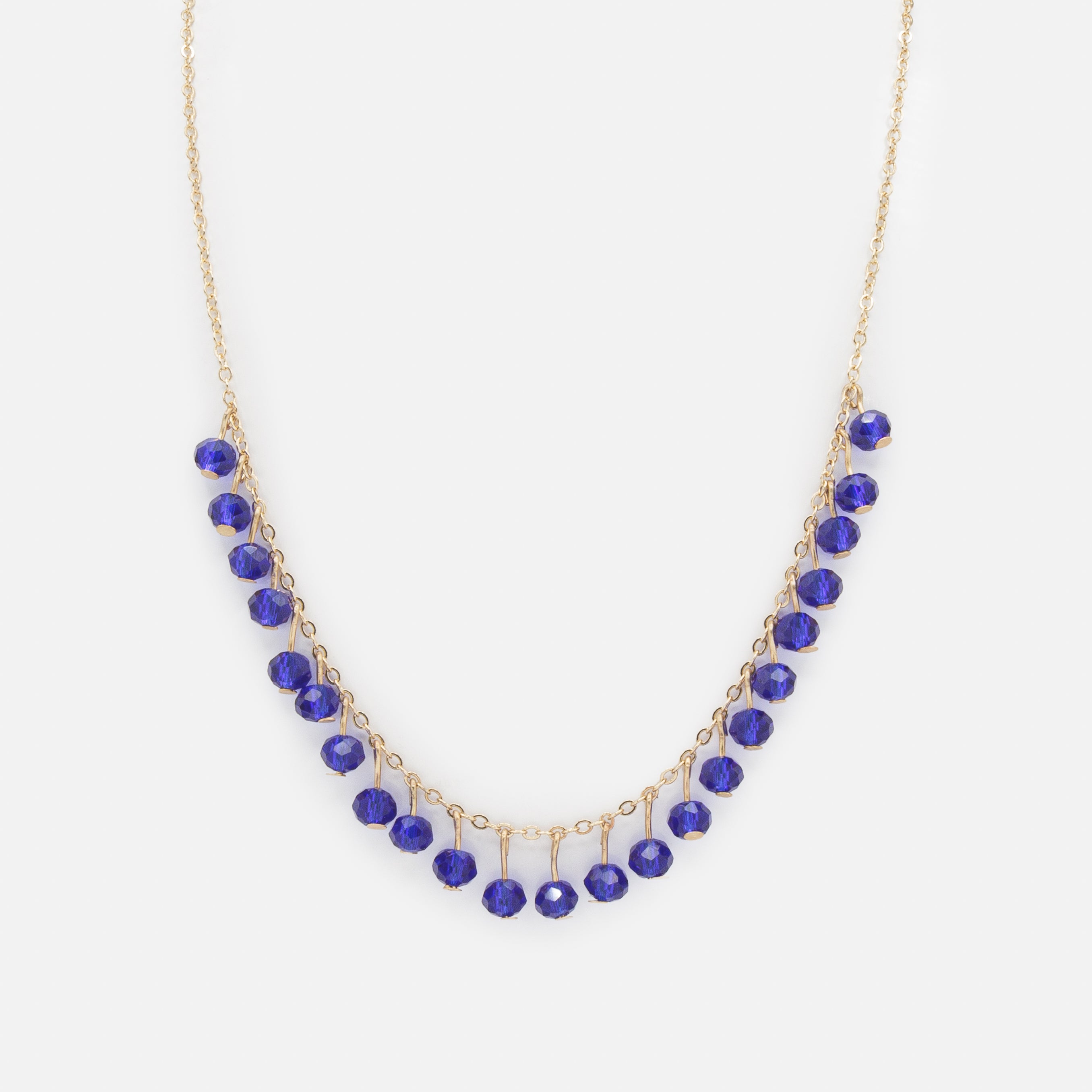 Ensemble collier à billes bleu royal et boucles d'oreilles dorées en triangles avec nacre et zircons cubiques