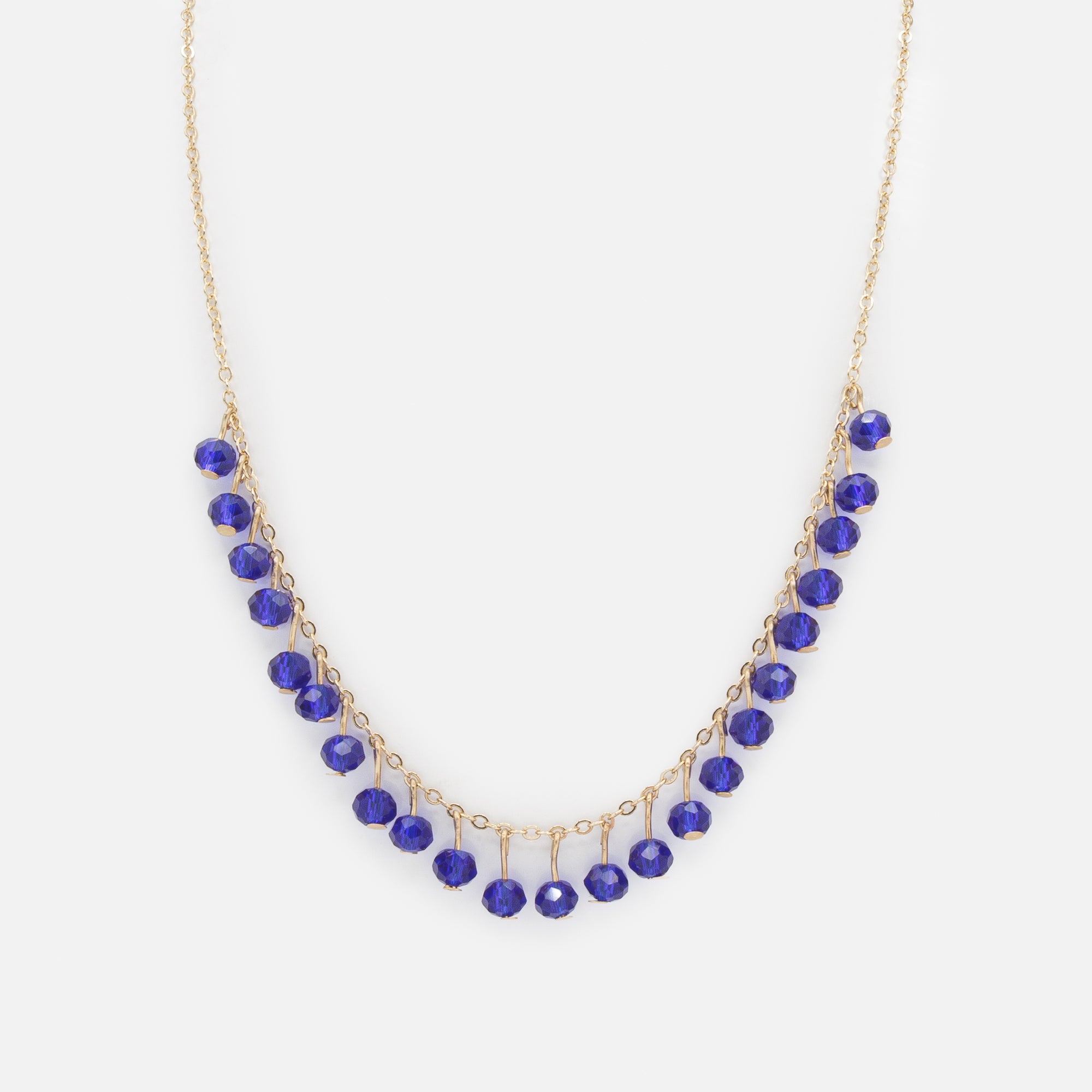 Royal blue ball necklace and gold triangle earrings set with mother-of-pearl and cubic zirconia