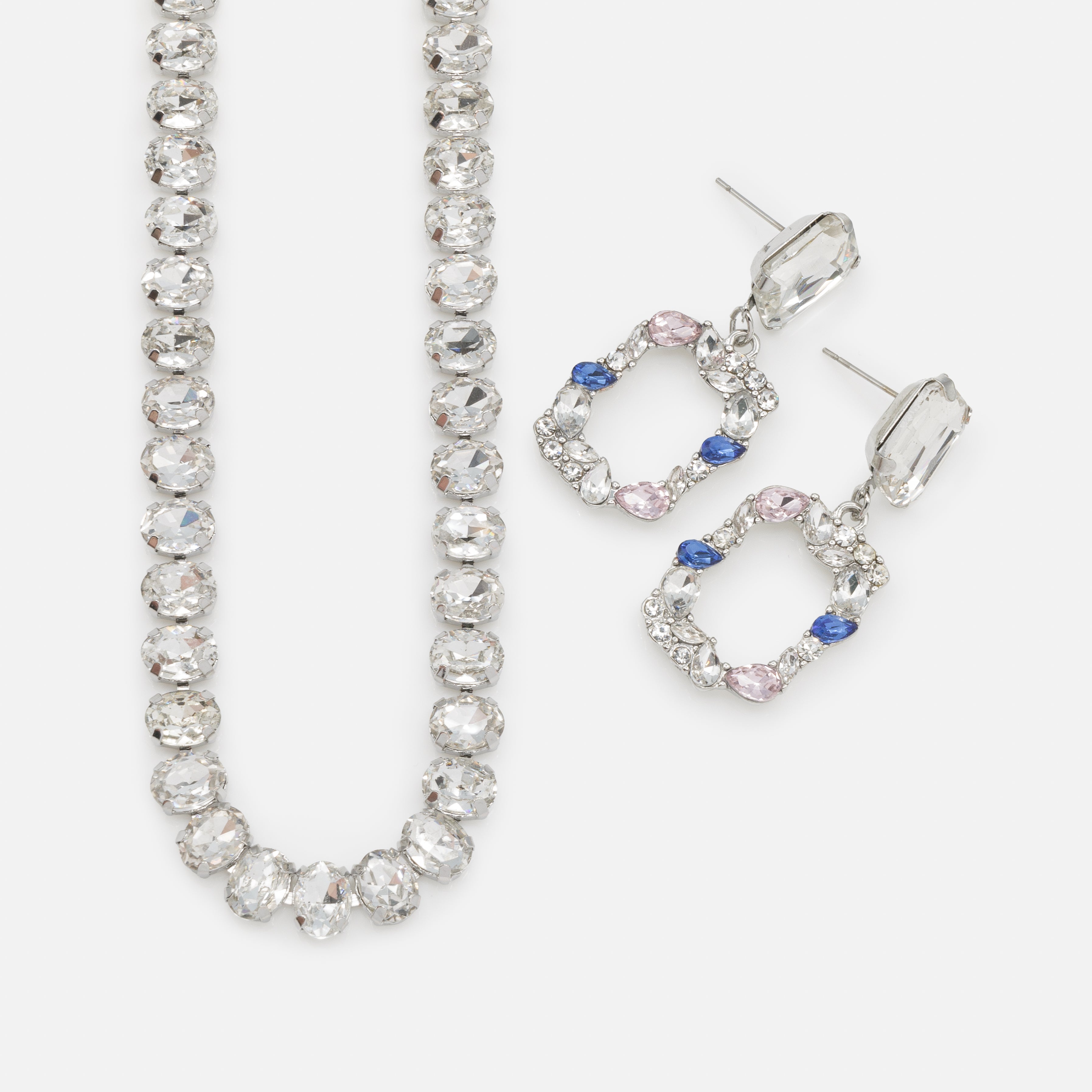 Ensemble rivière de zircons cubiques et boucles d'oreilles argentées avec pierres colorées