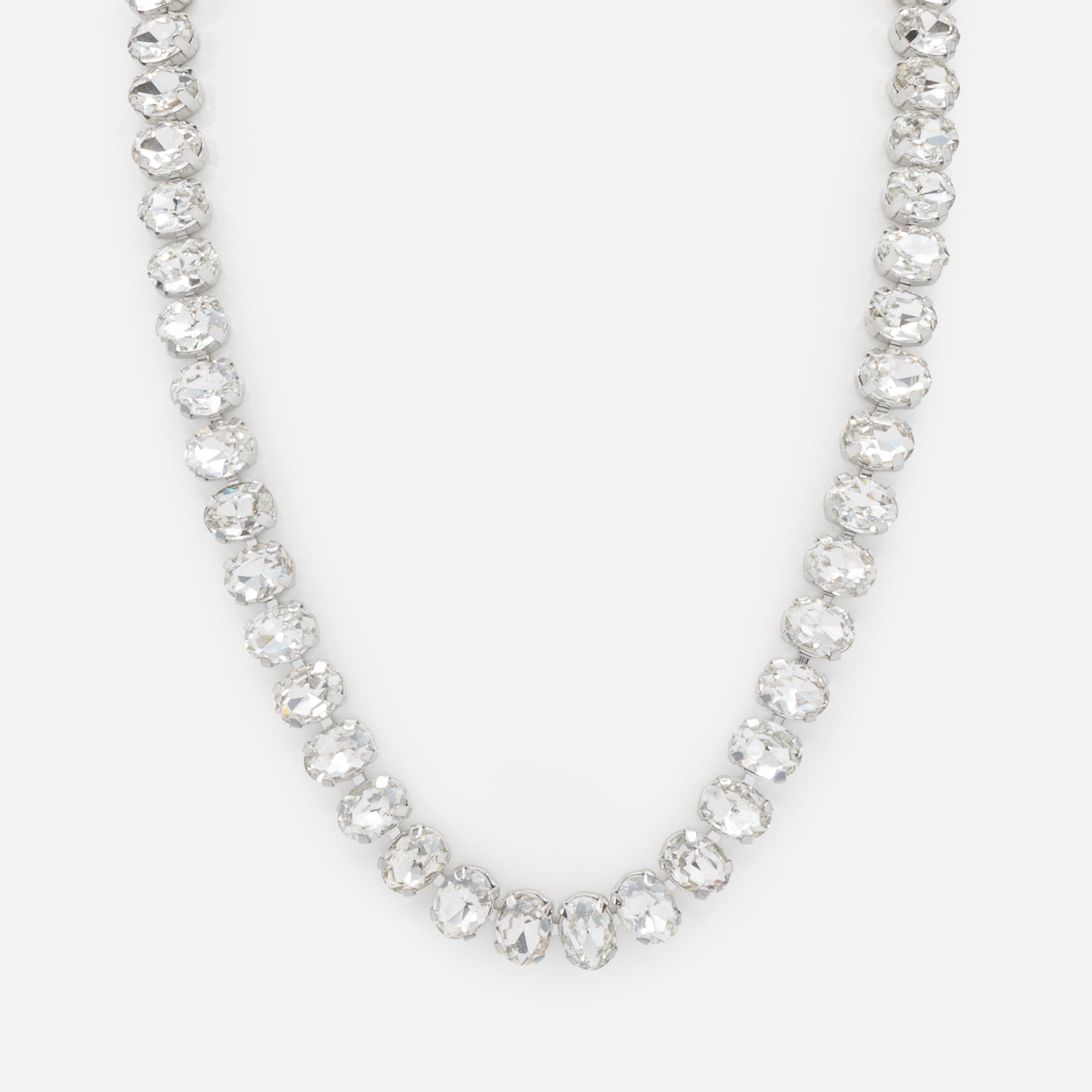 Ensemble rivière de zircons cubiques et boucles d'oreilles argentées avec pierres colorées