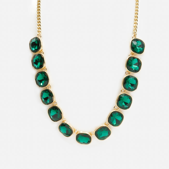 Ensemble collier et boucles d'oreilles dorées avec pierres émeraude