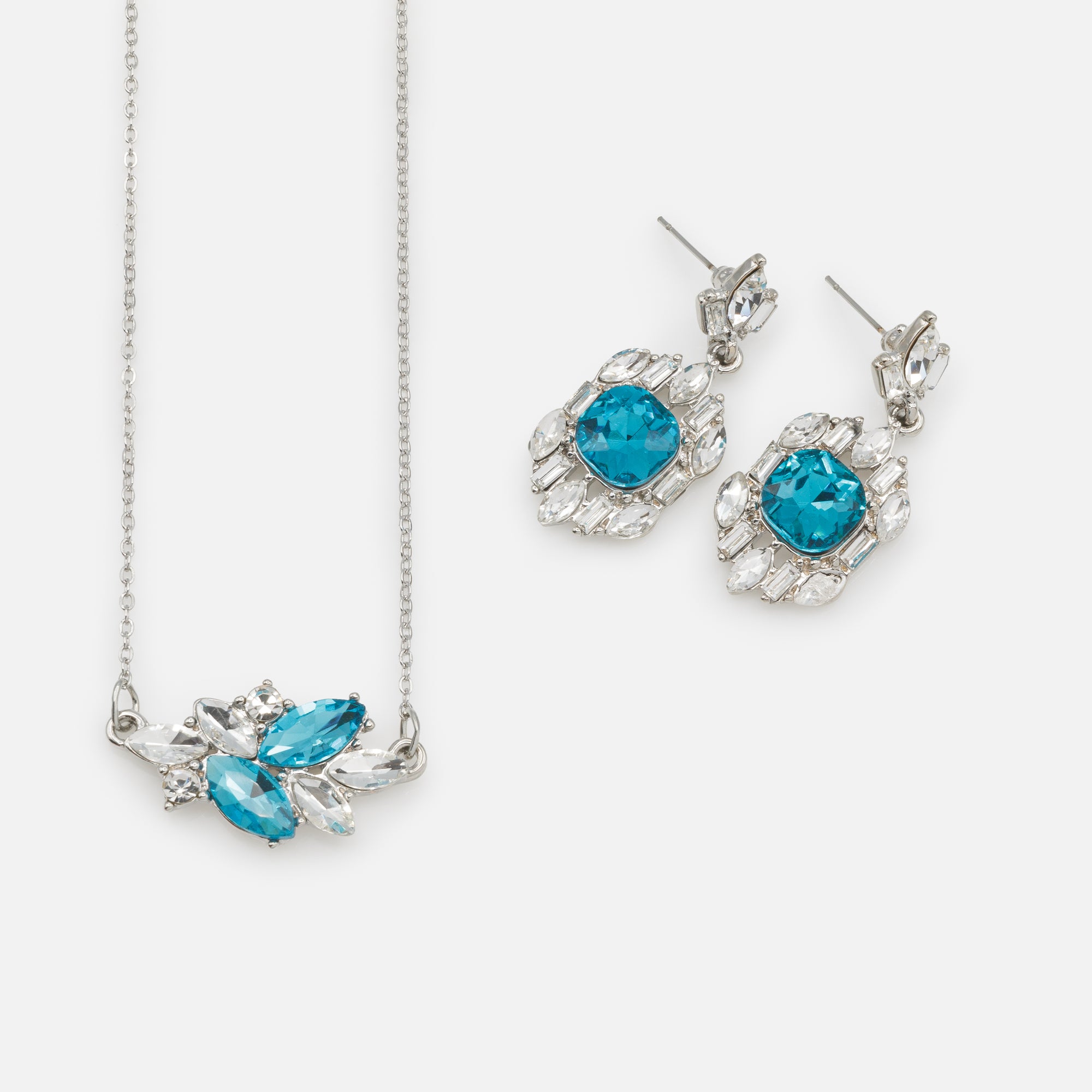 Ensemble collier et boucles d'oreilles pendantes argentés avec pierres blanches et turquoise