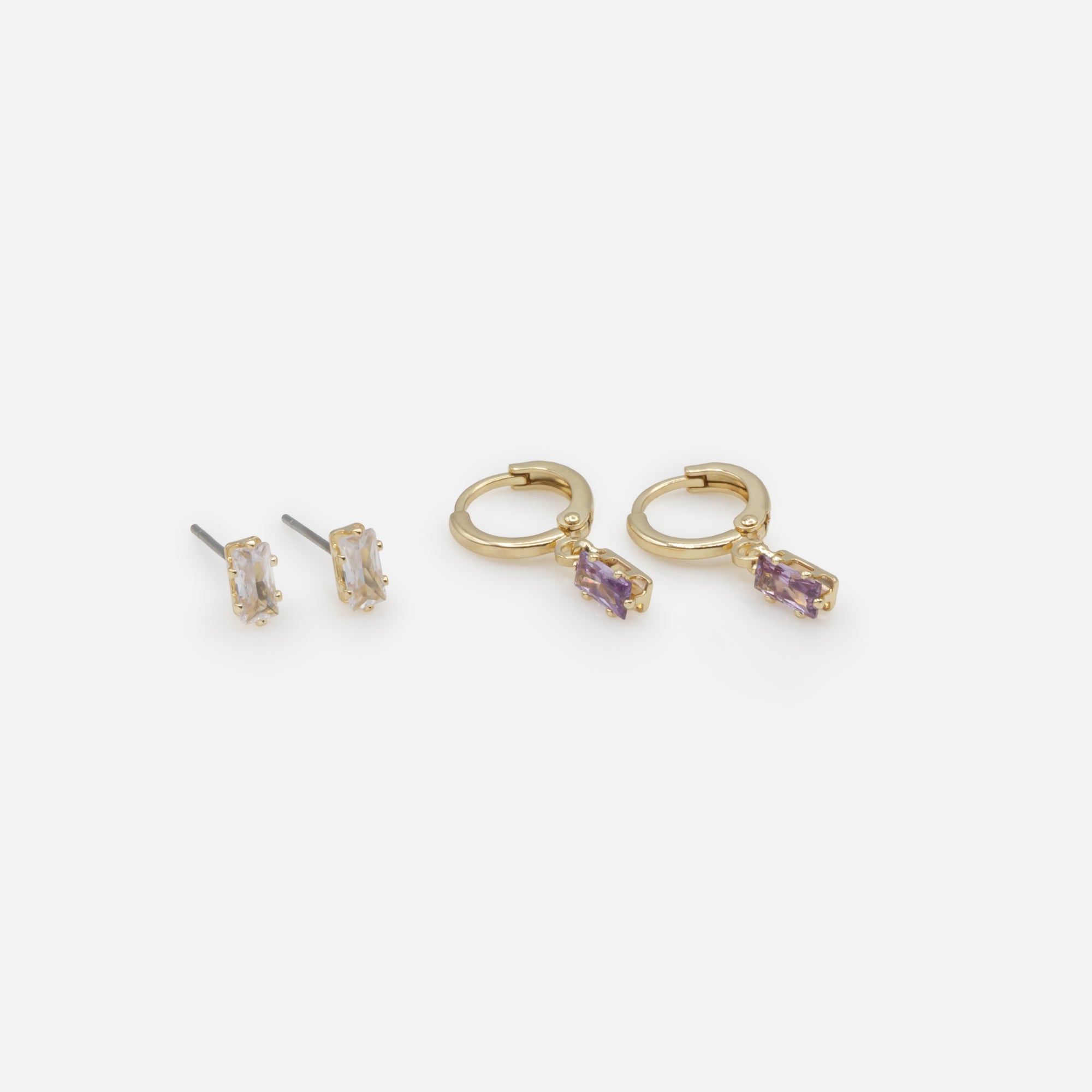 Duo of golden earrings with white stone and rings with purple stone charm