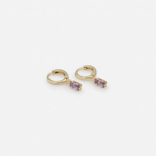 Load image into Gallery viewer, Duo of golden earrings with white stone and rings with purple stone charm
